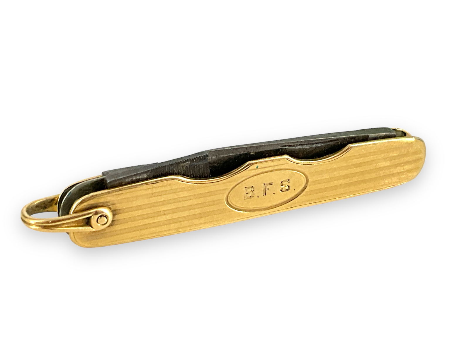 Monogrammed Pen Knife: Monogrammed Pen Knife Pen knife has a tested 14k outer case, is monogrammed ìBFSî and weighs 20.75 grams. Interior blades are not gold, originally made as a dual knife, one has been broken o