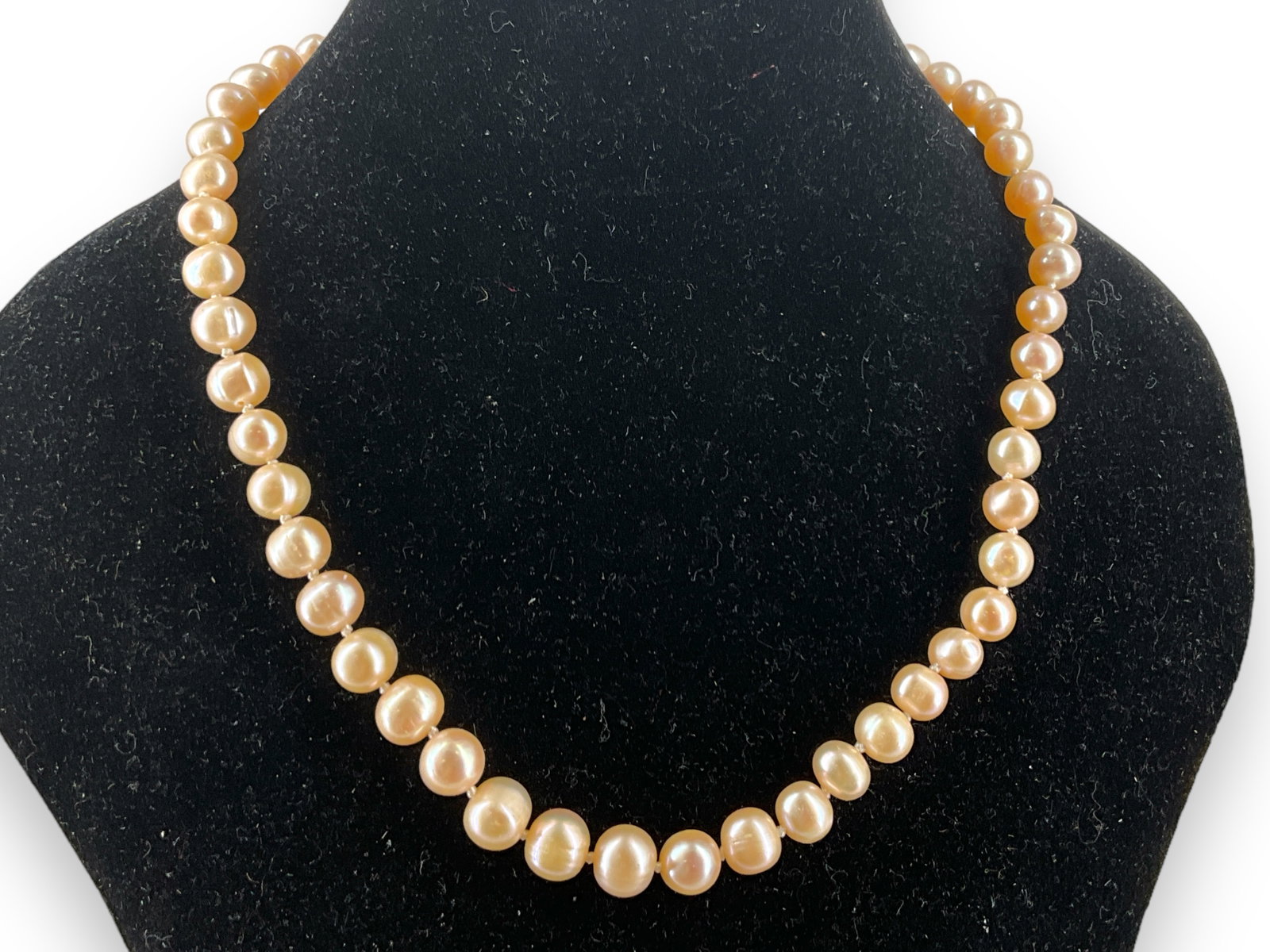 Cultured Blush Pearl Necklace: Cultured Blush Pearl Necklace Measuring pprox. (18î) in length, semi-round ringed peals (approx. 8.9mm - 8.4mm) in size with peachy undertones, featuring moderate luster and blemishes, finishing 