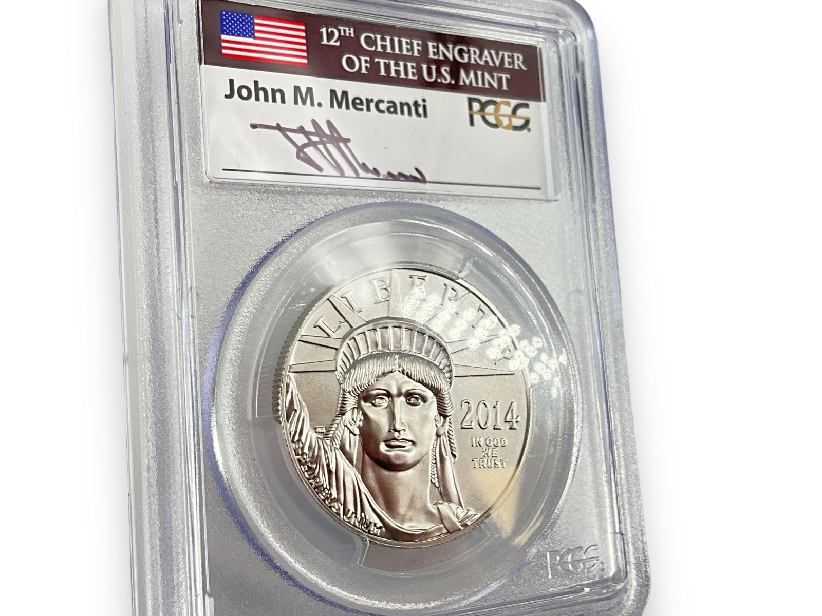 U.S. $100.00 1 oz. Platinum Bullion Coin - John M Mercanti Signature: * U.S. $100.00 1 oz. Platinum Bullion Coin - John M Mercanti Signature Dated 2014, first strike, 9995 platinum composition (1 oz.), Statue of Liberty design on obverse, graded MS69 in slab from PCGS n