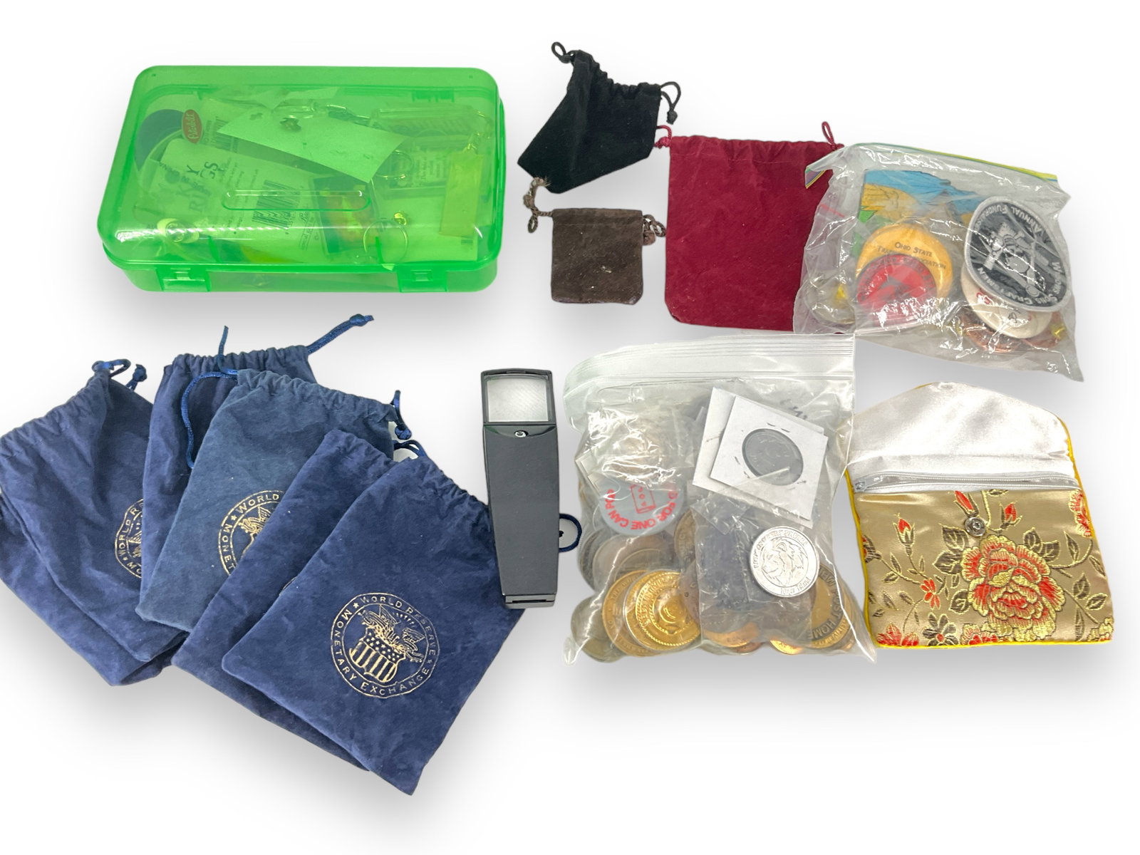 Lot of Coin Bags, Tokens, Patches, Pins and More: Lot of Coin Bags, Tokens, Patches, Pins and More Assorted drawstring coin bags, over-sized Mickey Mouse pins, new old stock tack pins on cards, assortment of pins and patches including Membership and 