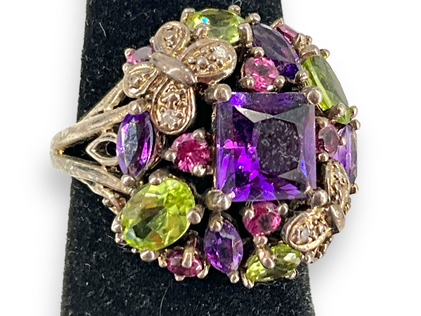 Pretty Multi-Color Stone Silver Ring: Pretty Multi-Color Stone Silver Ring Ring is stamped ìChina .925î and tested for silver, has amethyst, peridot and tiny melee diamond stones, is a size 6 and weighs 5.27 grams. *Ring w/Stone