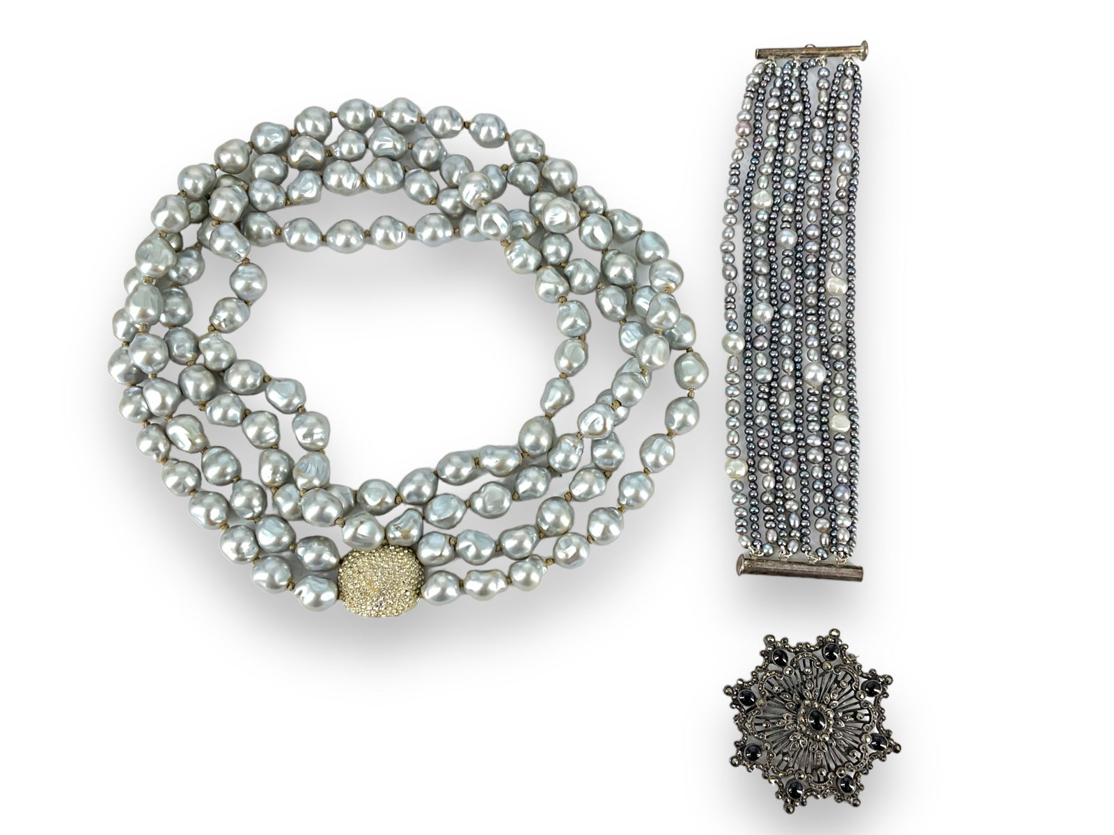 ìCinerî Fashion Necklace, Marcasite Pin and Freshwater Pearl Bracelet: ìCinerî Fashion Necklace, Marcasite Pin and Freshwater Pearl Bracelet Costume necklace has a gold-tone paveí diamantÈ clasp stamped ìCinerî attached to a double-strand of