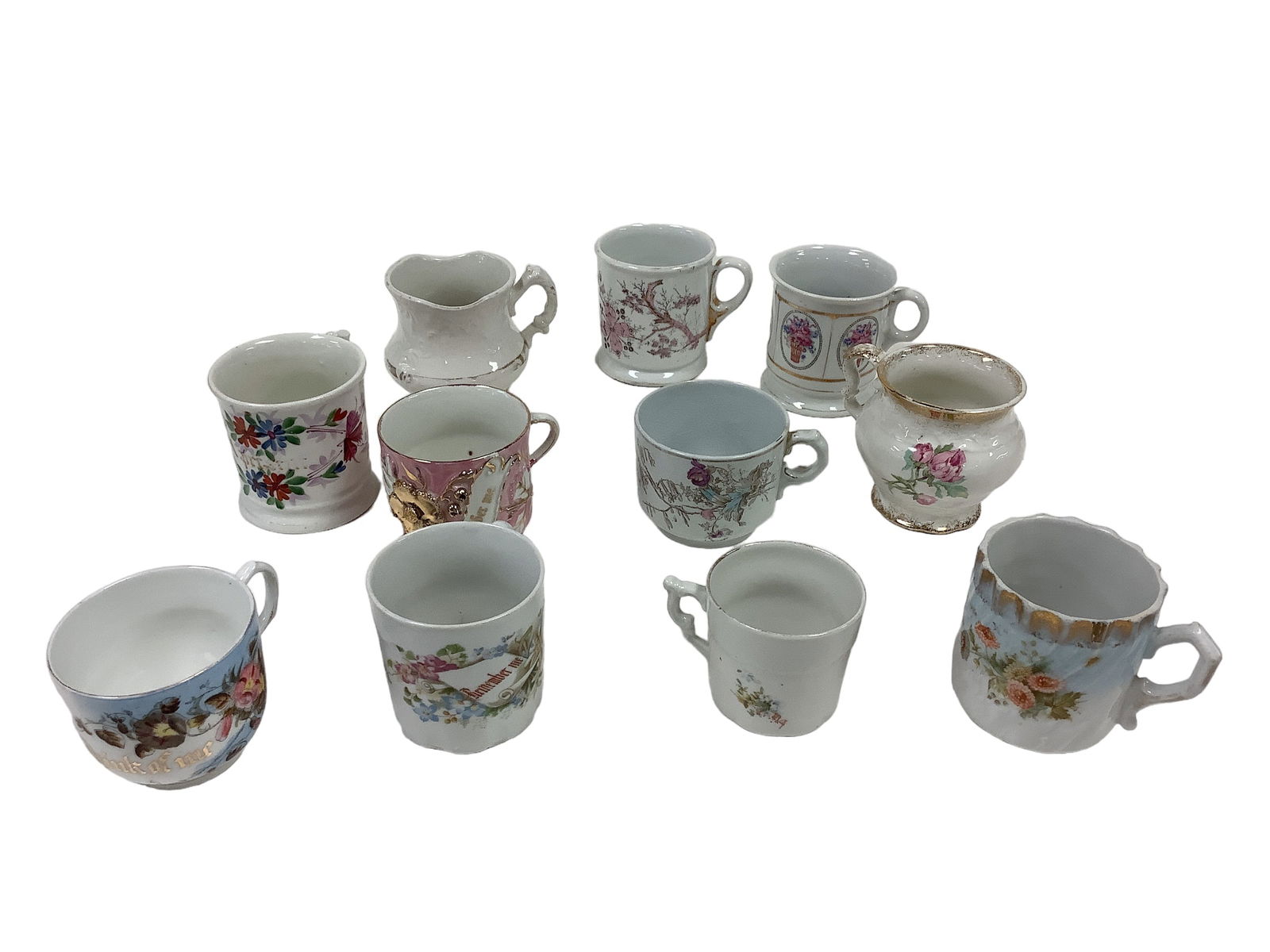 Mug Collection: Mug Collection Lot of 11. Please see photo for marks on bottom of cups. Many pieces have slight to significant crazing.