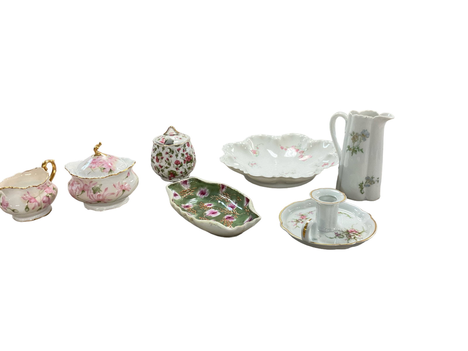 Limoges Pieces: Limoges Pieces Lot of 7. Creamer and sugar bowl, candle stick holder, jam jar no ladle, fruit bowl,candy dish and creamer pitcher.used