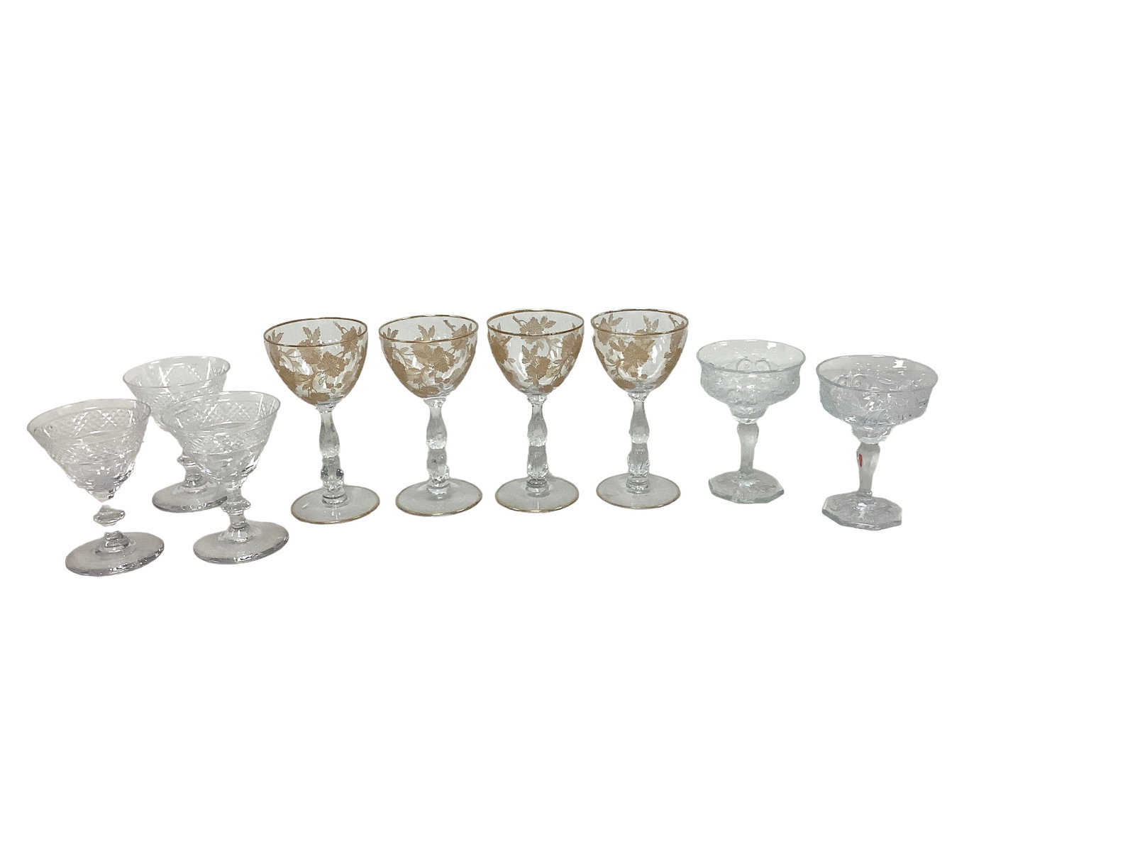 Cambridge Glass: Cambridge Glass Lot of 9. Includes (4) cocktails with gold encrusted Blossom Time etch, (3) pressed cocktails with cut flutes at bottom of bowl and a band of cut. Xís around top and (2) cocktails
