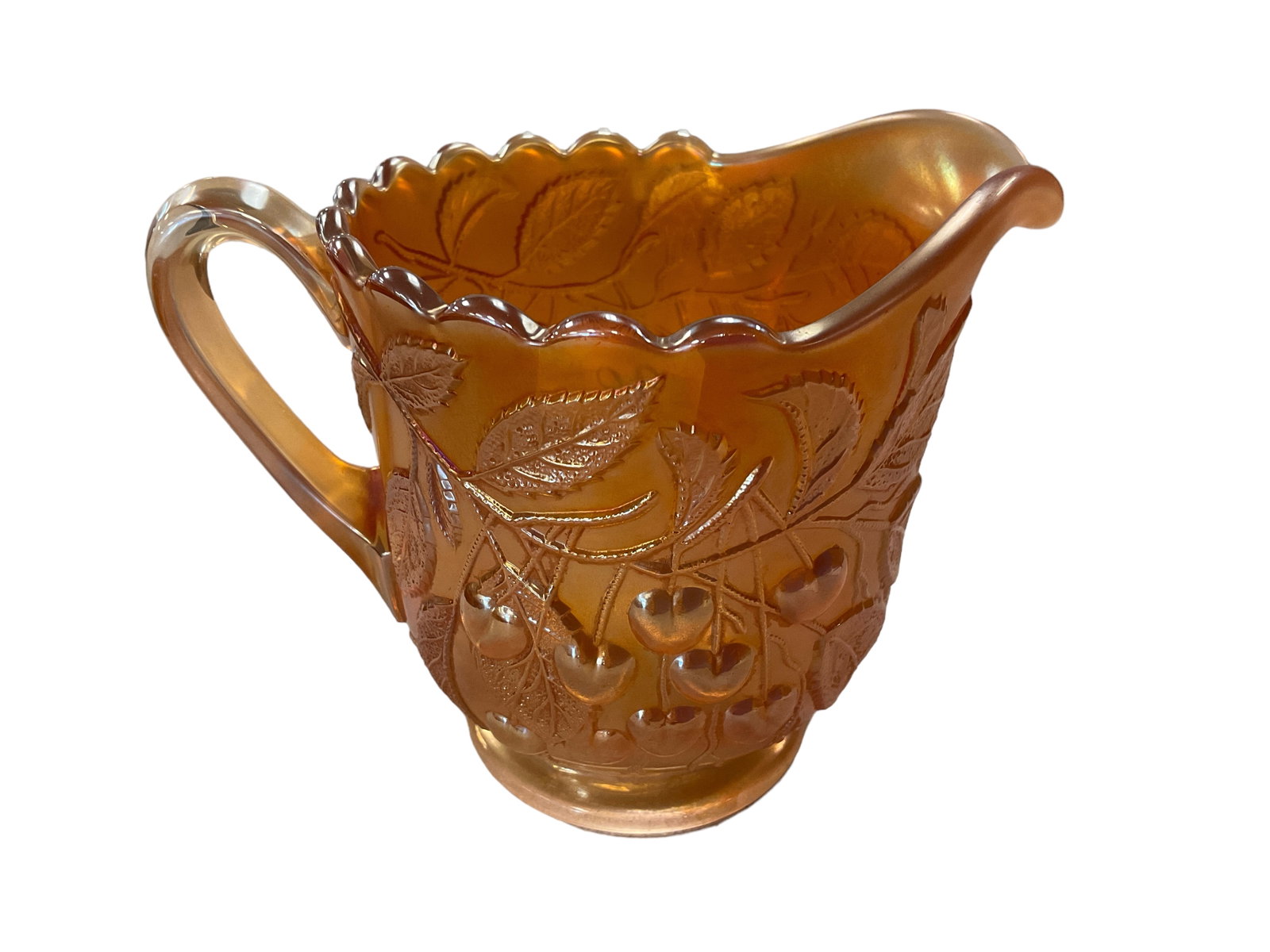 Possibly Millersburg Carnival Hanging Cherries Creamer. Marigold: Possibly Millersburg Carnival Hanging Cherries Creamer. Marigold 4 1/4î H 3.5î Diameter.