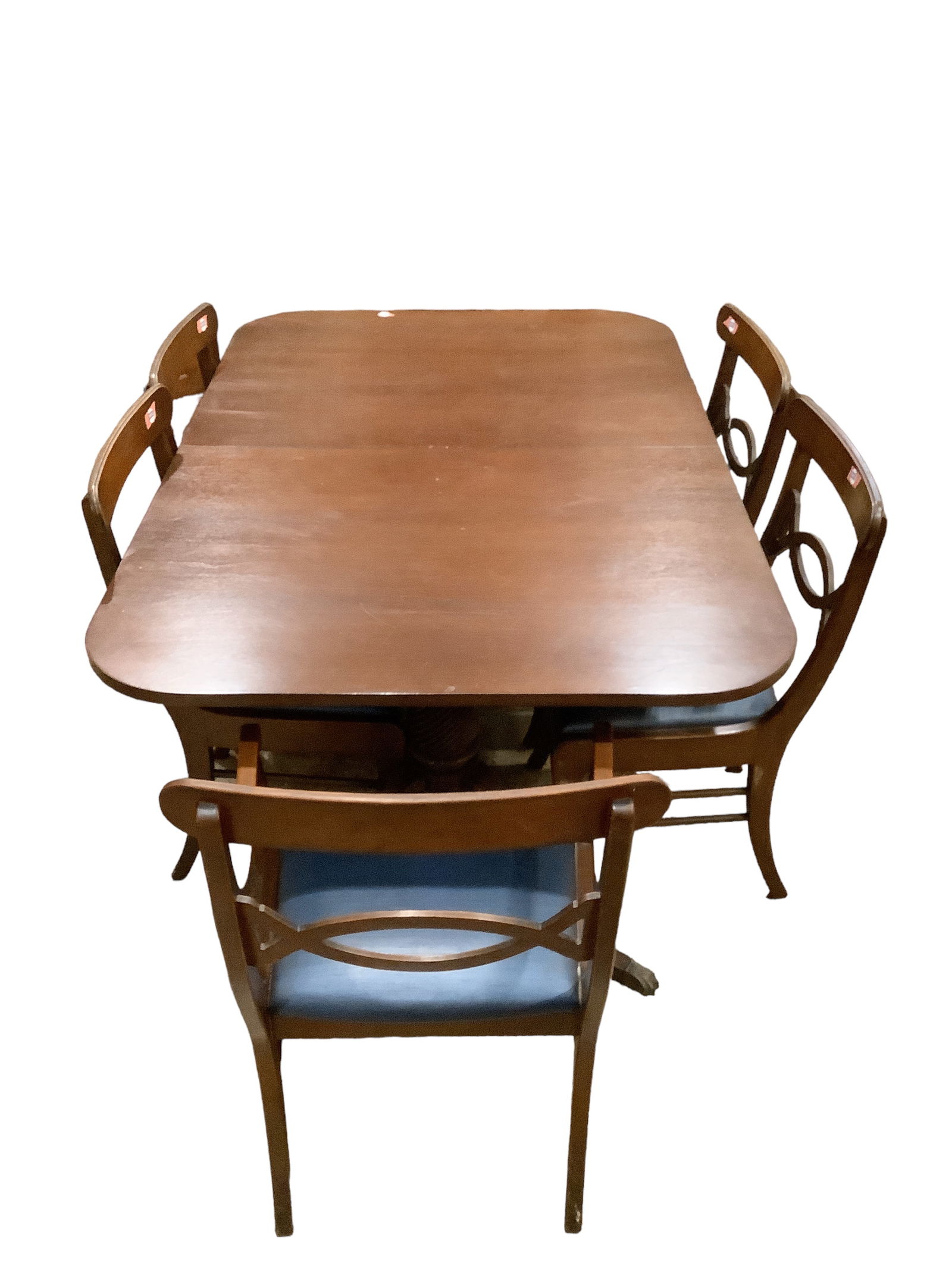 Mahogany Duncan Phyfe Dining Table and Eight Chairs: Mahogany Duncan Phyfe Dining Table and Eight Chairs Some surface scratches to table and chairs. 42î x 64î x 30.5î Chairs are 35î tall. Table has two leaves.