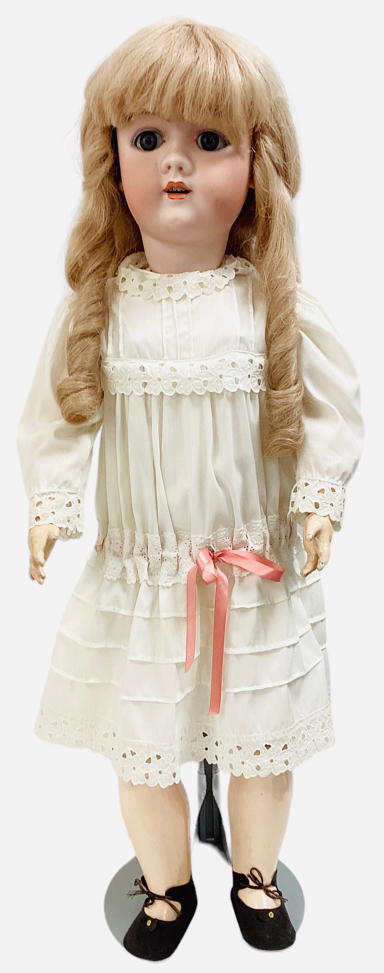 German bisque socket head girl marked "H".: German bisque socket head girl marked "H". 31" doll with replaced human hair wig, glass sleep eyes, open mouth with teeth, on jointed composition body. Bisque has no apparent damage, composition has s