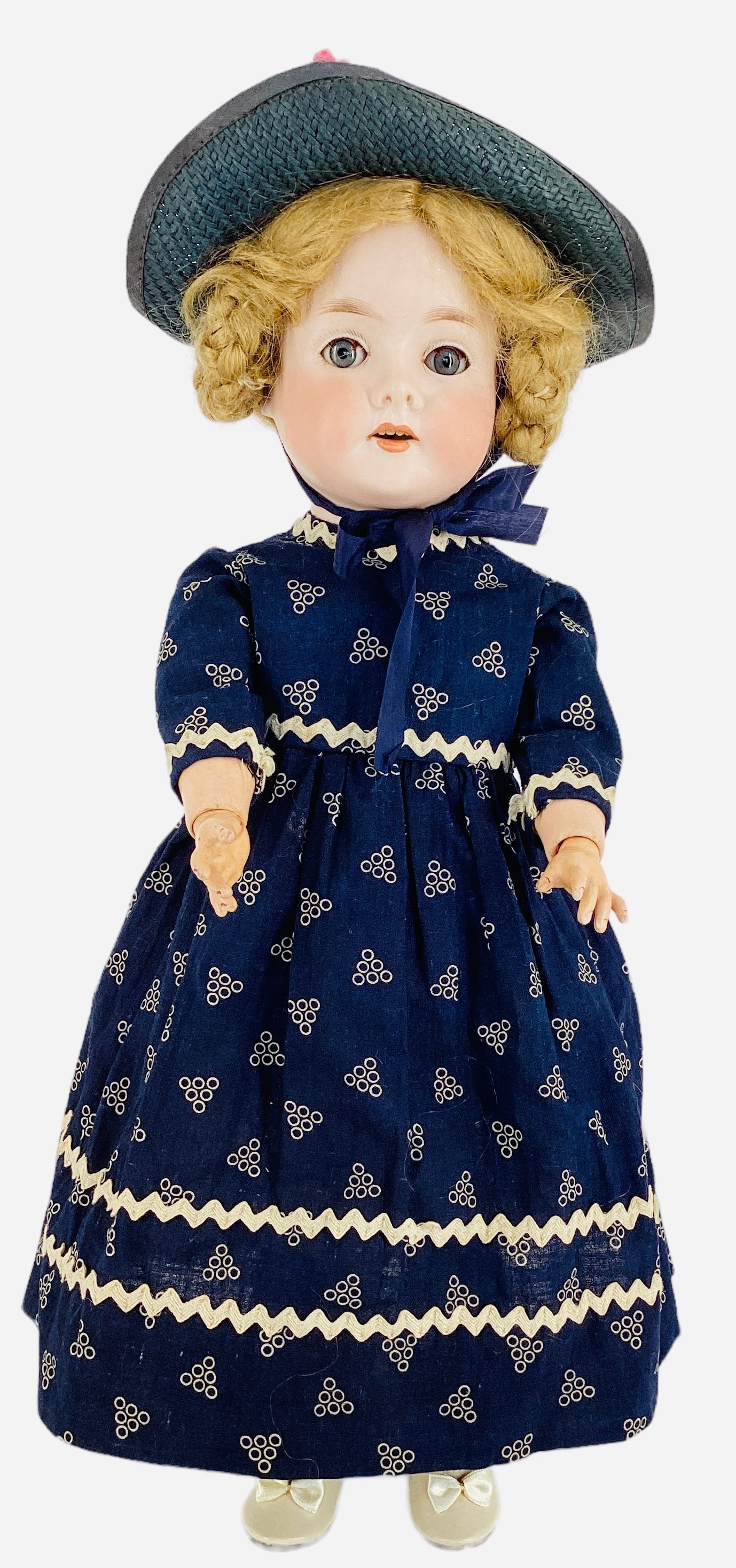 C.M. Bergmann 1916 bisque socket head child.: C.M. Bergmann 1916 bisque socket head child. 16 1/4" doll with mohair wig, glass sleep eyes, open mouth with teeth, on jointed composition body. Wig glued on and not removed for inspection.