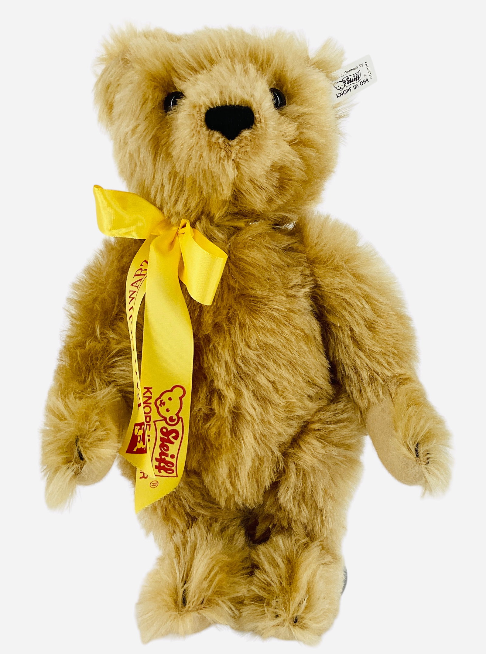 Steiff "Musical Teddy Bear": Steiff "Musical Teddy Bear" Produced exclusively for FAO Schwarz, 12" mohair bear with key wind music box. Limited Edition No. 316/2000, comes with original box and COA. Box lid is damaged.