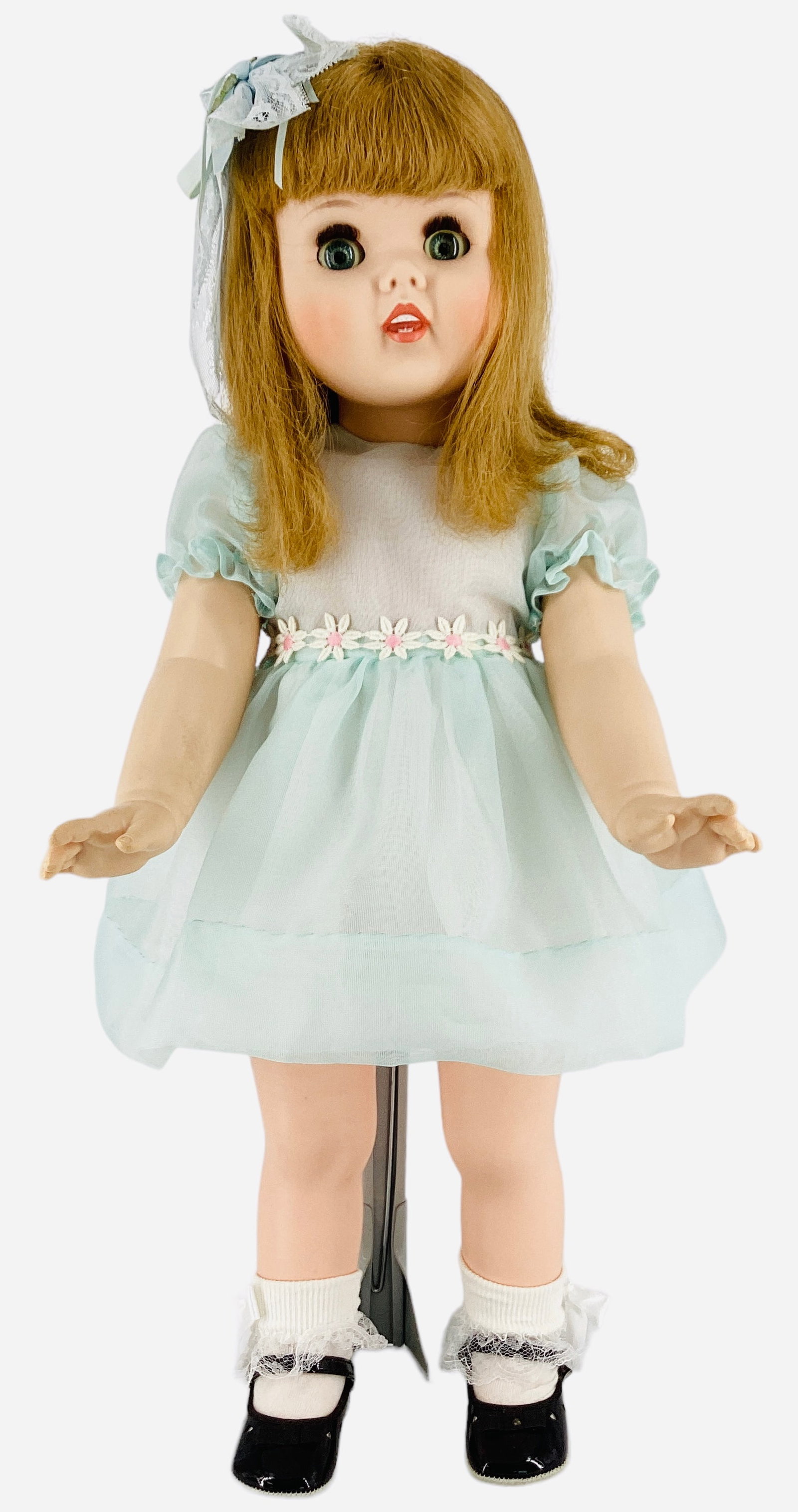 American Doll & Toy Corp. "Toddles".: American Doll & Toy Corp. "Toddles". Circa 1960, 24" doll with rooted synthetic hair, sleep eyes with eyelashes, open/closed mouth with molded and painted teeth, on five-piece walker body, appropriate