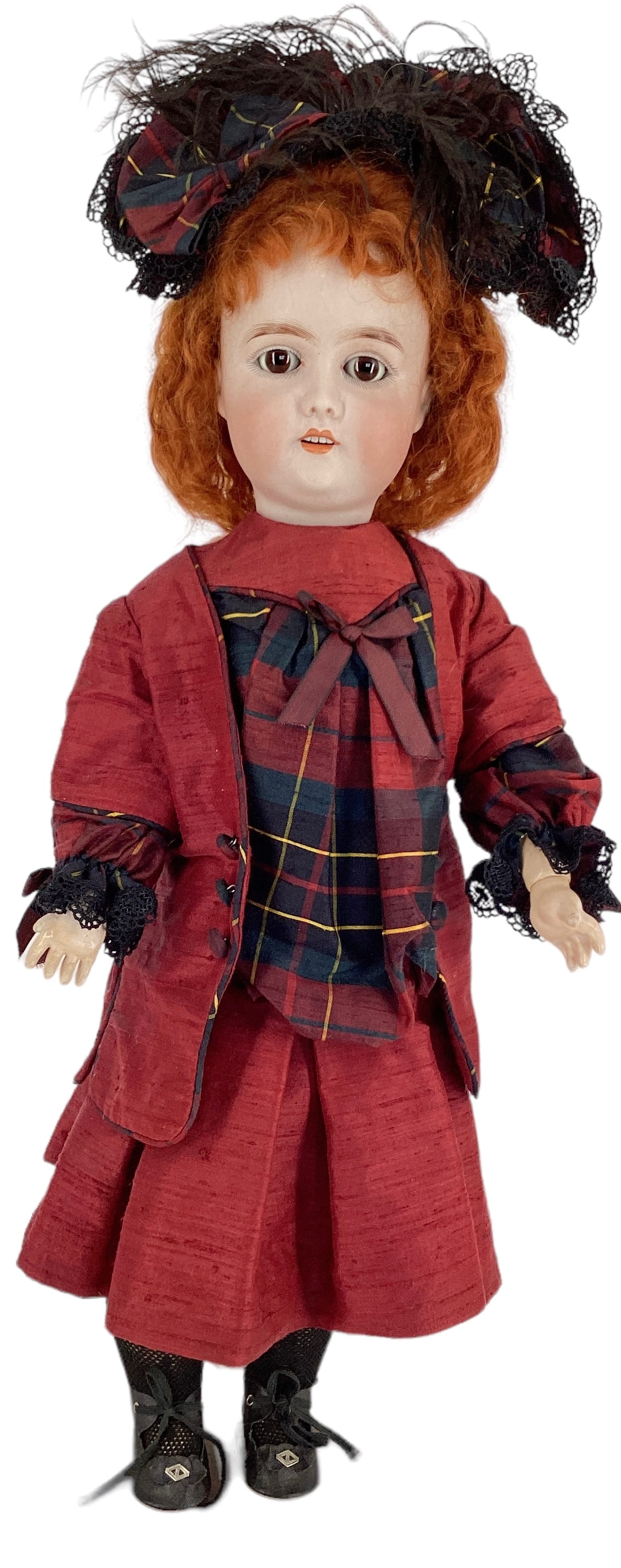 Gebruder Kuhnlenz 165 bisque socket head girl.: Gebruder Kuhnlenz 165 bisque socket head girl. 22" doll with replaced mohair wig, glass sleep eyes, open mouth with teeth, on jointed composition body, nicely redressed. Bisque has no apparent damage.