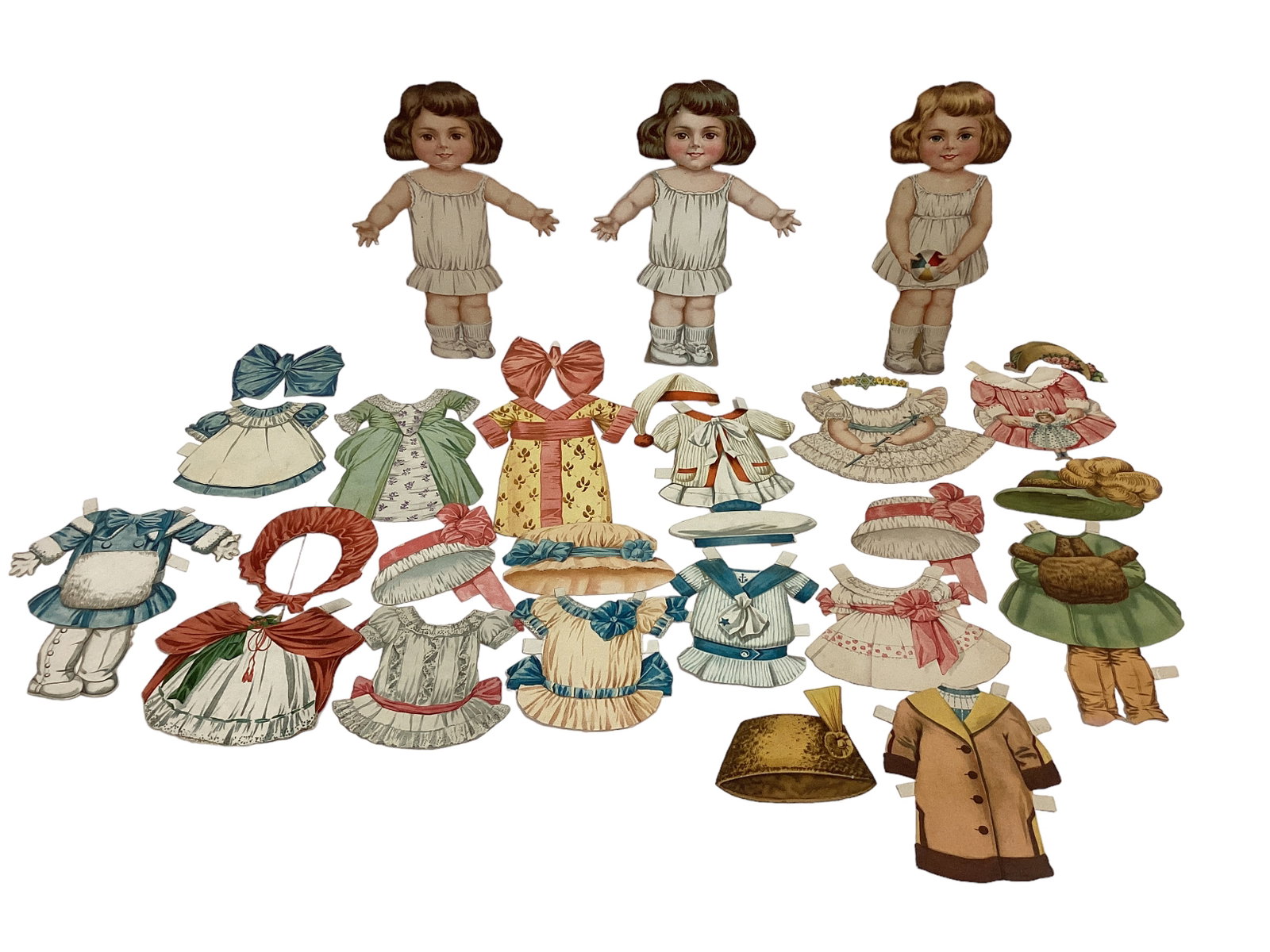 Cut 9î Woolworth Paper Dolls with Costumes: Cut 9î Woolworth Paper Dolls with Costumes Lot of 3 Paper Dolls with Costumes. Printed in Germany, dolls marked no. 1, no. 3. All have some creases, right index finger peeled off of one.