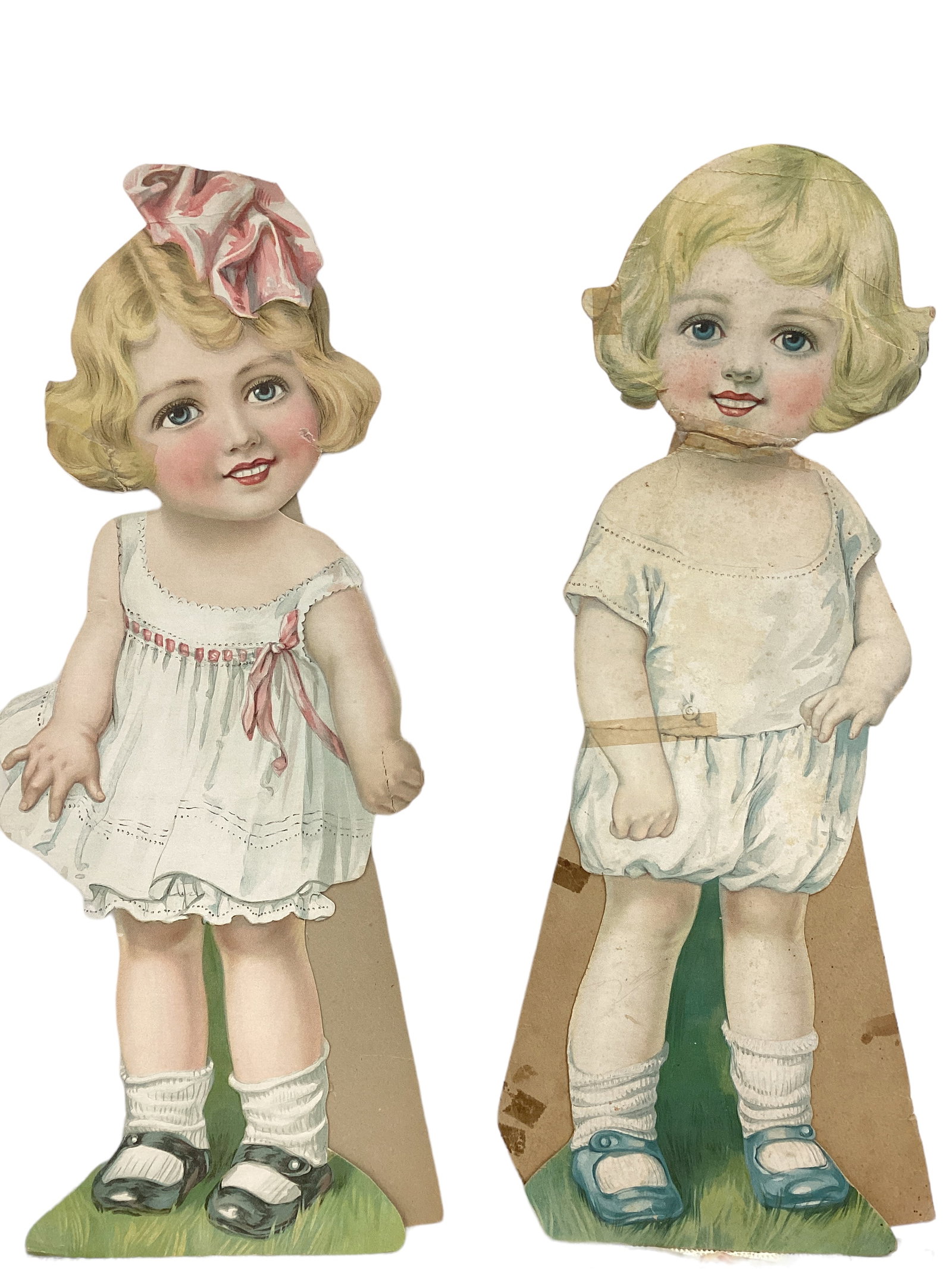 Vintage Woolworth 19î & 20î Paper Dolls with Clothes: Vintage Woolworth 19î & 20î Paper Dolls with Clothes Lot of 2. Taller doll has torn, taped neck, arm. Smaller doll has missing color on cheek, taped hair.