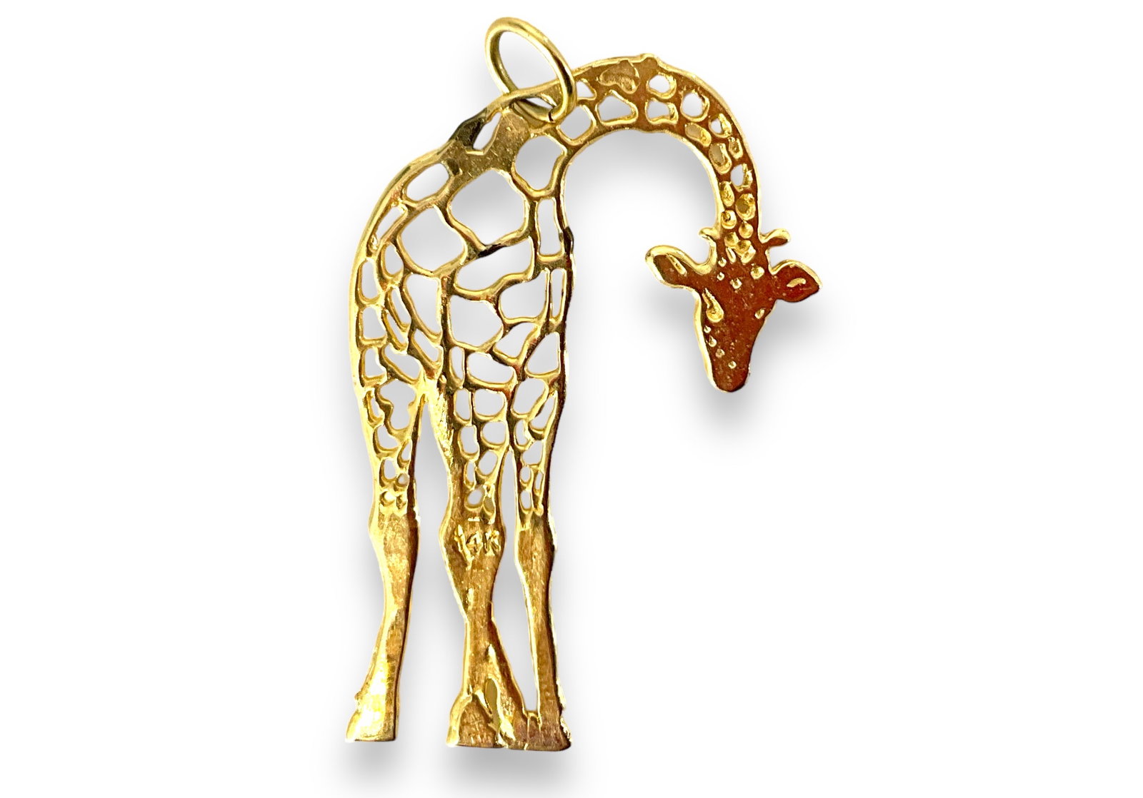 14kt Yellow Gold Giraffe Pendant: 14kt Yellow Gold Giraffe Pendant Measuring approx. (1.55î x 0.95î) openwork design, stamped and tested (1.8 grams tw).
