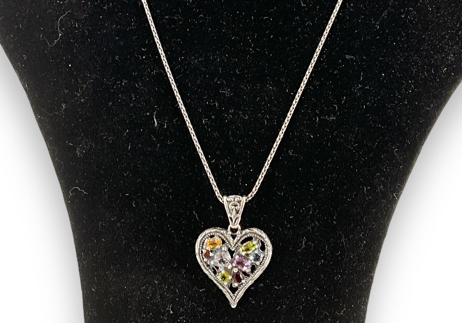 Sterling Silver Necklace with Heart-Shape Pendant: Sterling Silver Necklace with Heart-Shape Pendant Made in Israel, stamped/tested 925/sterling silver, 0.36 troy ounces total weight, 19" princess length, pendant features an assormtent of faceted mult