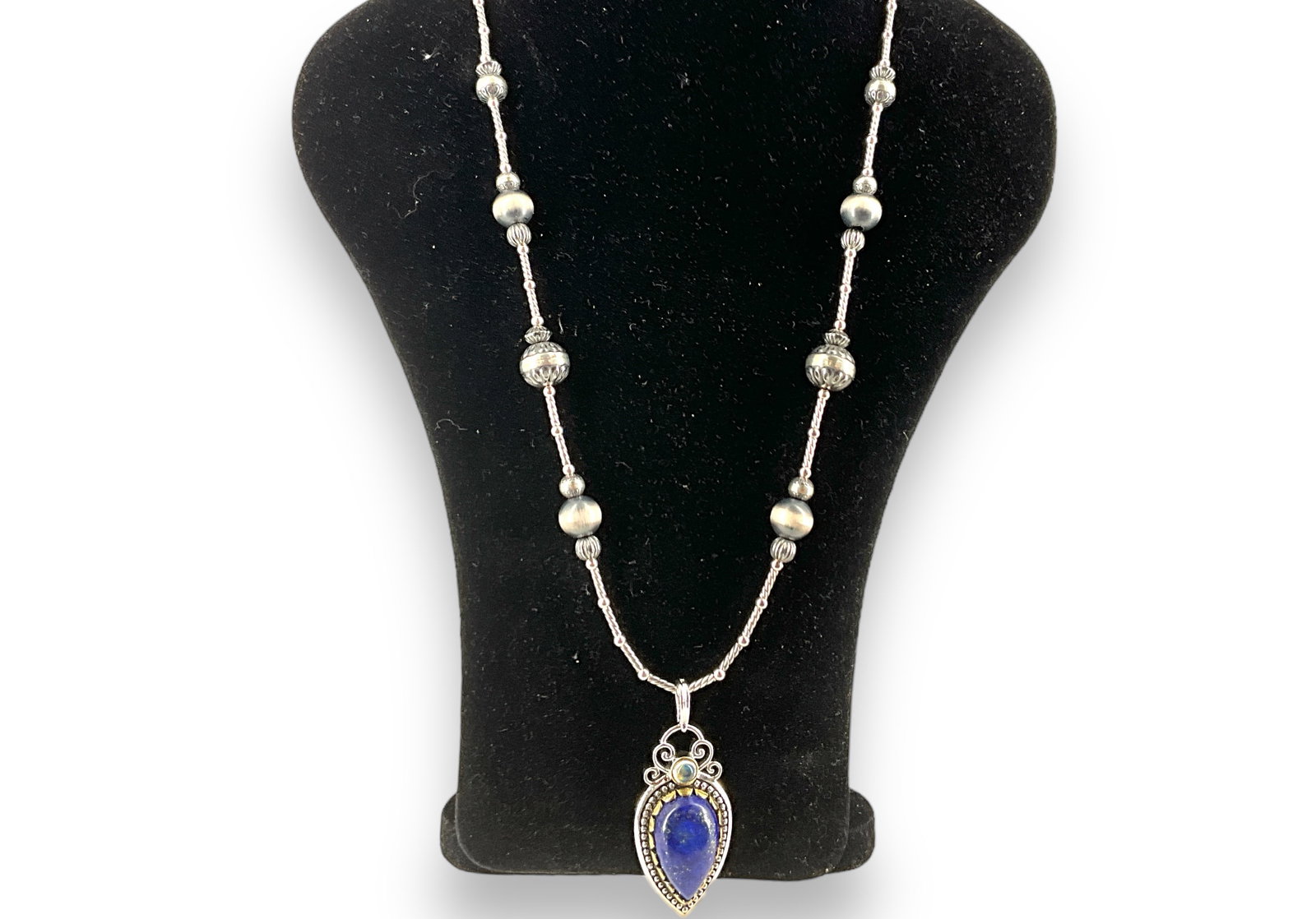 Modern Sterling Silver Necklace from American West: Modern Sterling Silver Necklace from American West Modern design, like new condition, 24" matinee length chain, adorned with beads measuring up to 12.0mm in size, lobster hook clasp closure, 46.5mm pe