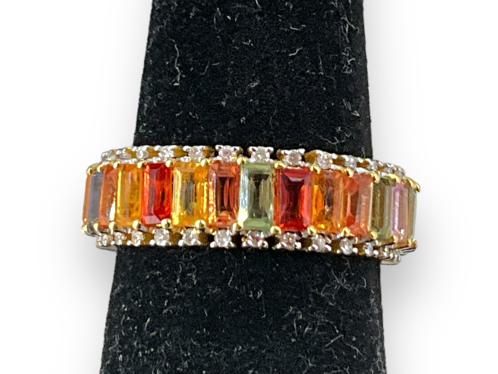 10kt Yellow Gold Schiller Stone Ring: 10kt Yellow Gold Schiller Stone Ring Size () bypass shank style ring accents with (2) schiller stone cabochons - rounded (approx. 5.3mm & 4.8mm) in diameter, stamped 18kt but tests as 10kt, bid with d
