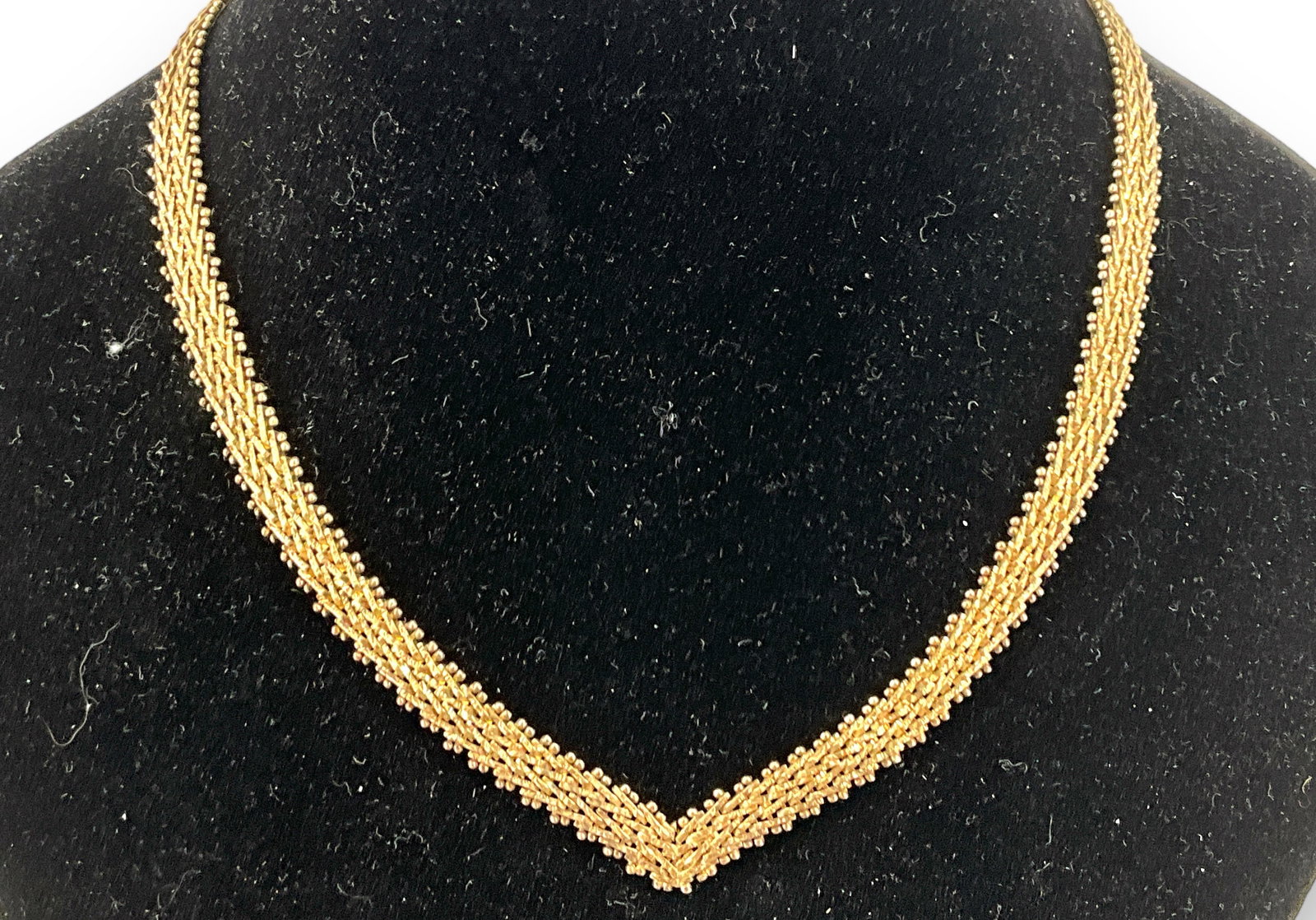 Sterling Silver/Vermeil Necklace: Sterling Silver/Vermeil Necklace Chevron chain with milgrain beading, v-shape, 0.945 troy ounces total weight, lobster hook clasp closure, 17" princess length, 7.5mm in width.
