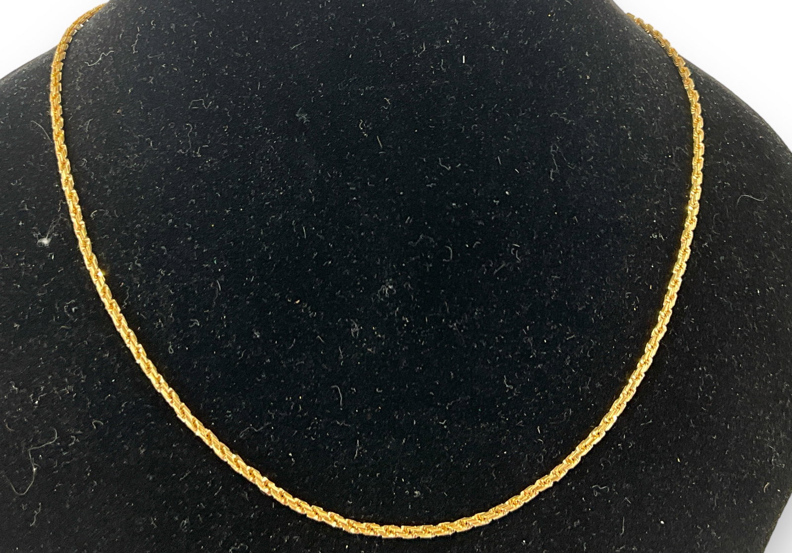 14kt Yellow Gold Necklace: 14kt Yellow Gold Necklace Measuring (18î) in length, spiral chain with geometric style links, stamped, tested and signed ìMetallioî, lobster clasp closure, stamped and tested (7.9 grams