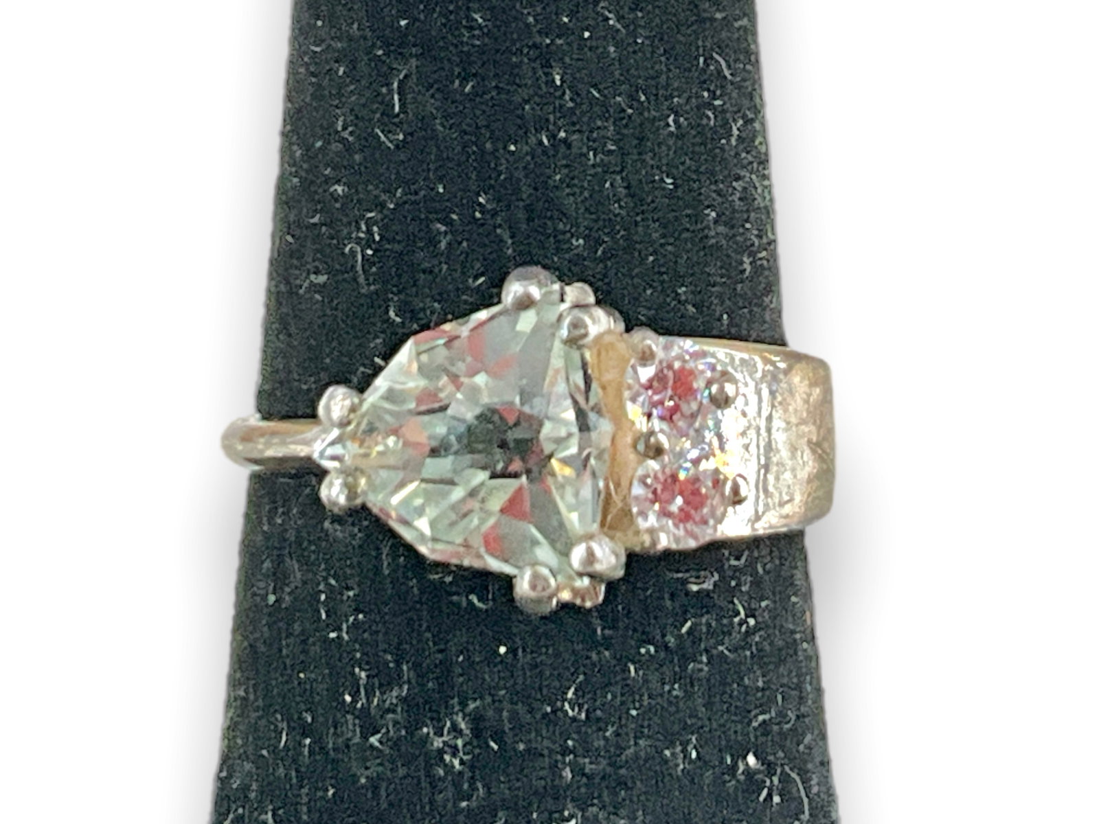 Sterling and Stone Ring: Sterling and Stone Ring Size 6.5, stamped and tested sterling silver/925, 0.13 troy ounces total weight, with 8.0mm fantasy cut topaz stone at center accented by two smaller clear diamante stone round