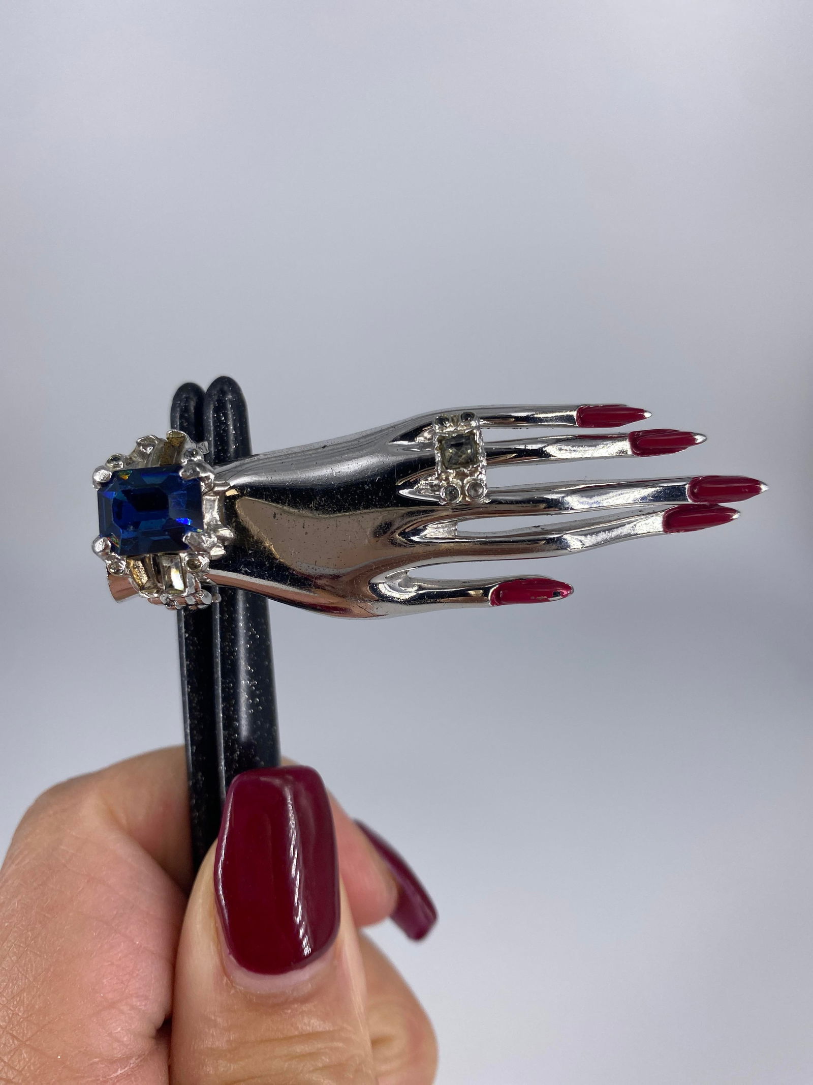 Delightful Coro Craft Sterling Silver Brooch: Delightful Coro Craft Sterling Silver Brooch Hand motif with enameled red nails, ring with clear rhinestones and bracelet with a blue rhinestone center stone and clear rhinestones accents - three miss