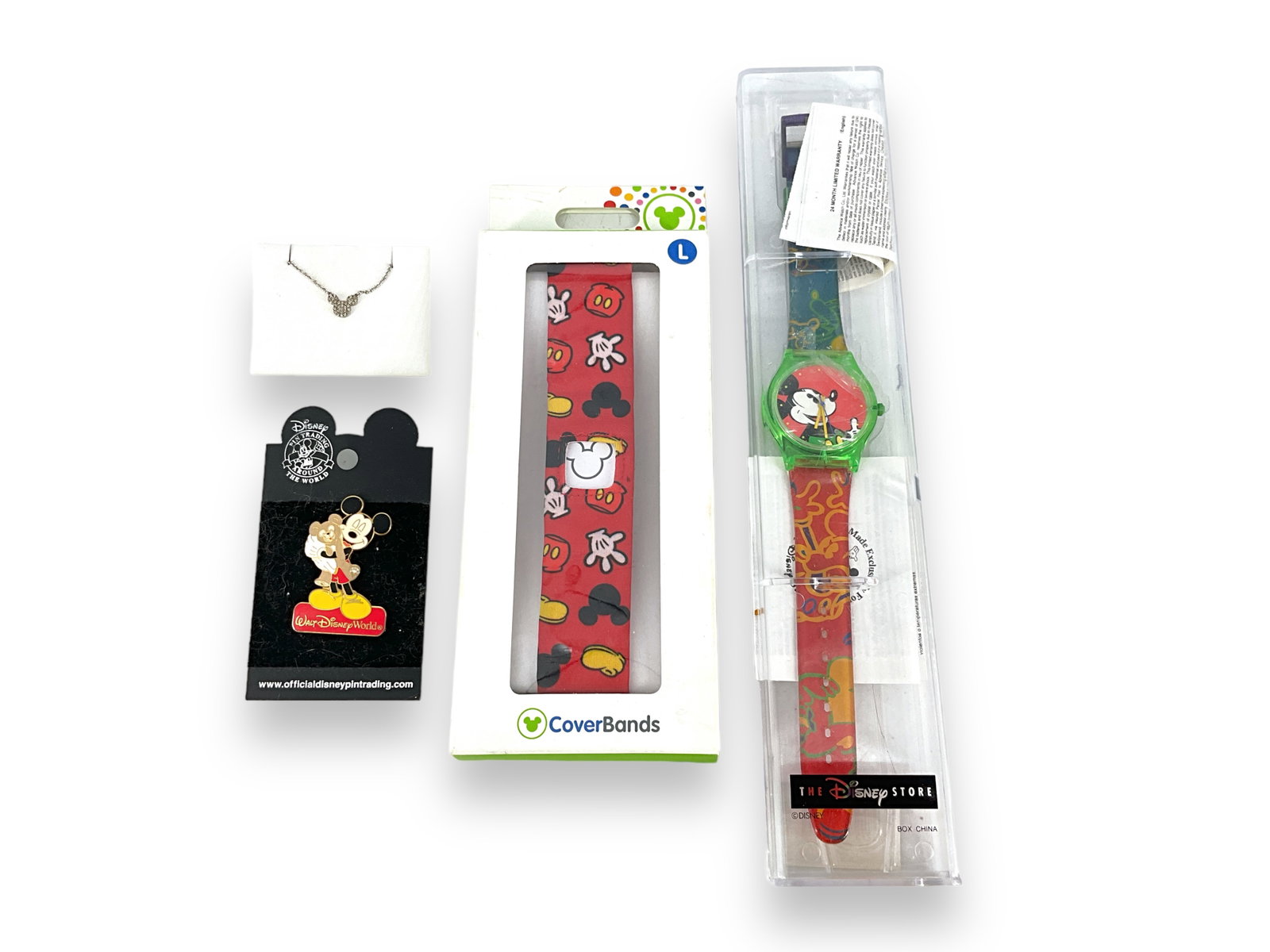 ìDisneyî Necklace, Watch, Band and Pin: ìDisneyî Necklace, Watch, Band and Pin ìDisneyî mouse ears tested silver necklace, appears unworn, has paveí clear stones, a ìDisneyî Mickey Mouse watch in the origi