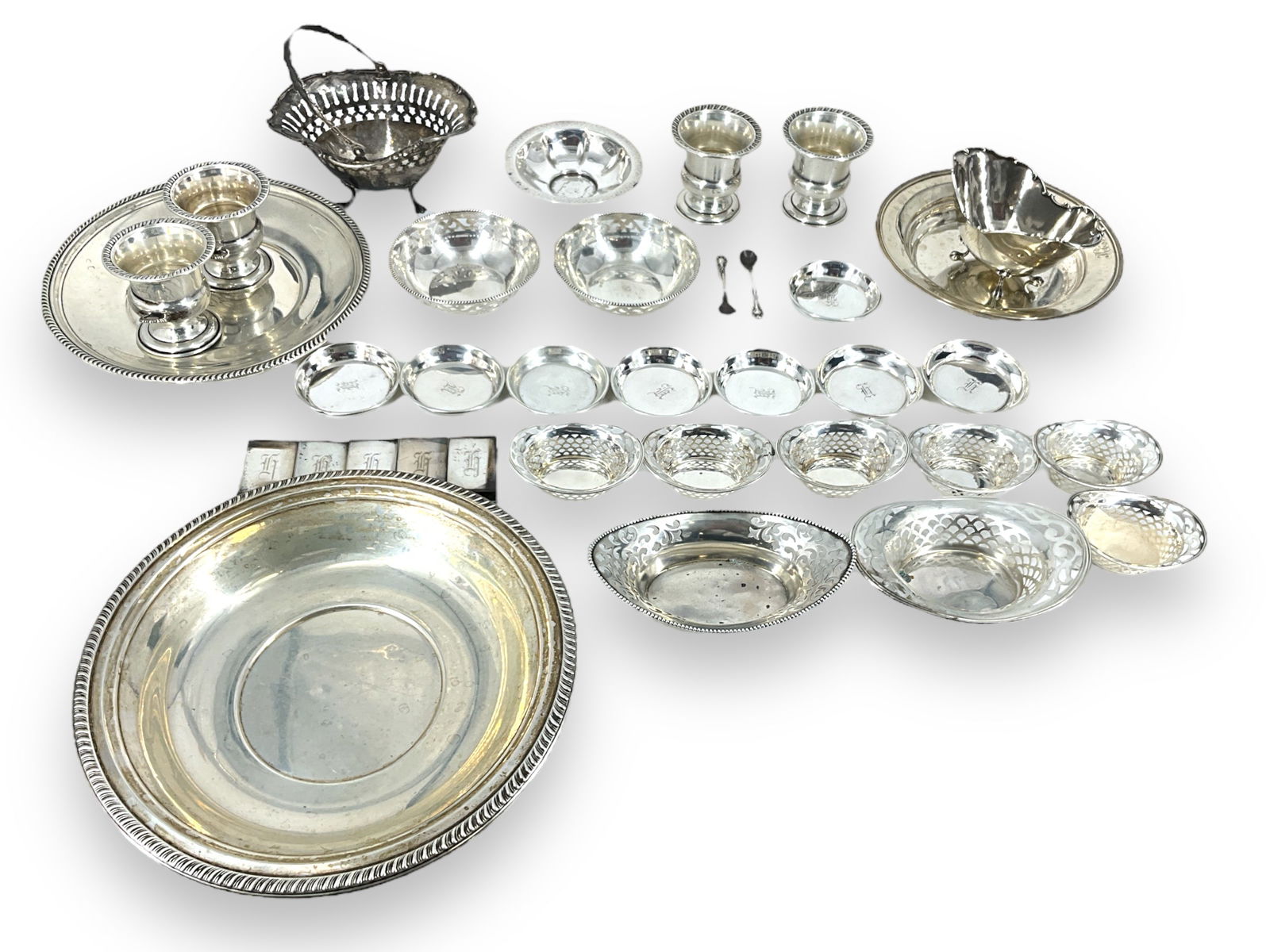Sterling Silver Housewares: Sterling Silver Housewares 48.18 troy ounces total weight. Manufacturers including F.F. Bonnet, Gorham, and more. Egg cups, small perforated dishes, three plates/shallow bowls, set of saucers engraved