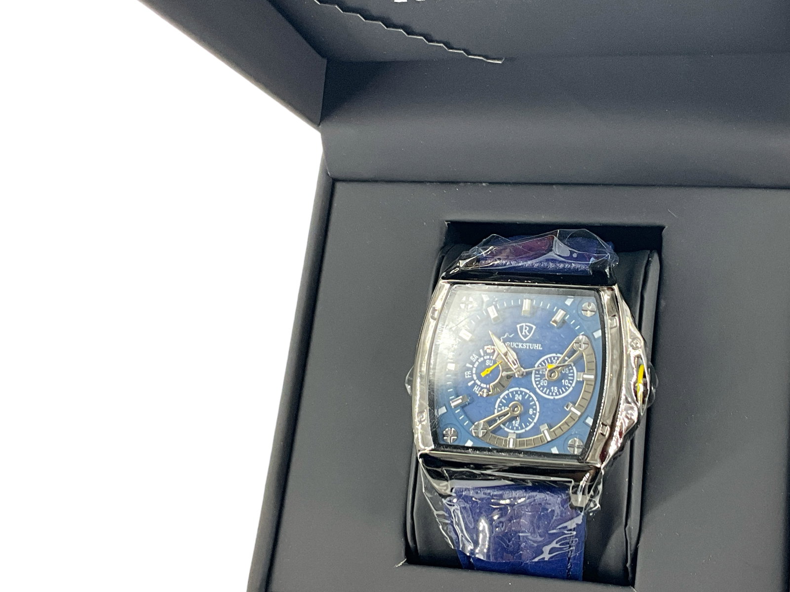 Modern Chronograph Wrist Watch from Ruckstuhl: Modern Chronograph Wrist Watch from Ruckstuhl New-old-stock, sleek modern design with unique case shape, in original box with packaging, quartz movement, working at time of listing, stainless steel ca