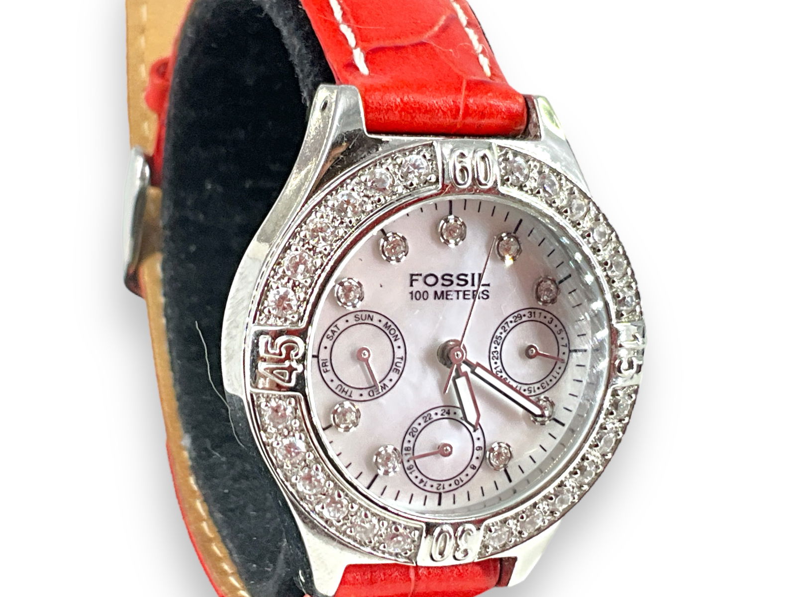 Fossil Blue BQ-9123 Ladies' Wrist Watch with M.O.P. Dial: Fossil Blue BQ-9123 Ladies' Wrist Watch with M.O.P. Dial Working at time of listing, stainless steel case and band, water resistant, case and dial adorned with Swarovski crystal rounds, with mother-of