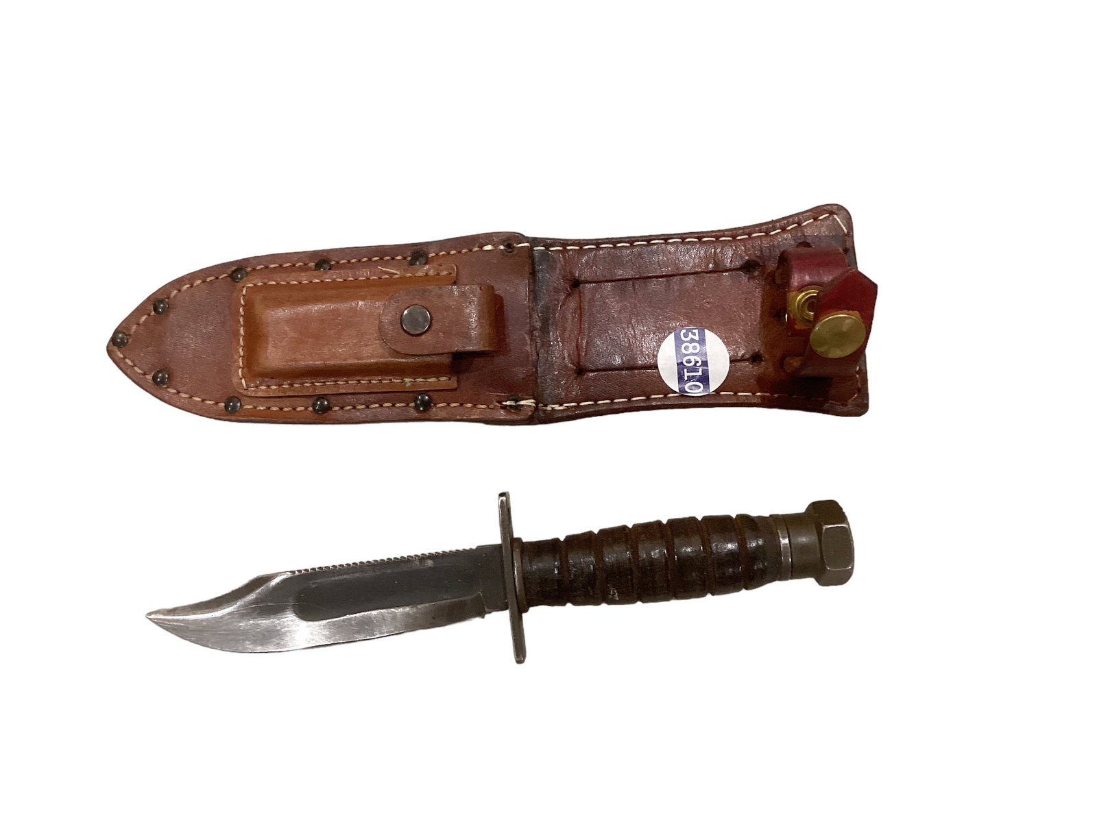 Survival Knife in Leather Sheath: Survival Knife in Leather Sheath The blade measures 5î long. There is a sharpening stone in the sheath.
