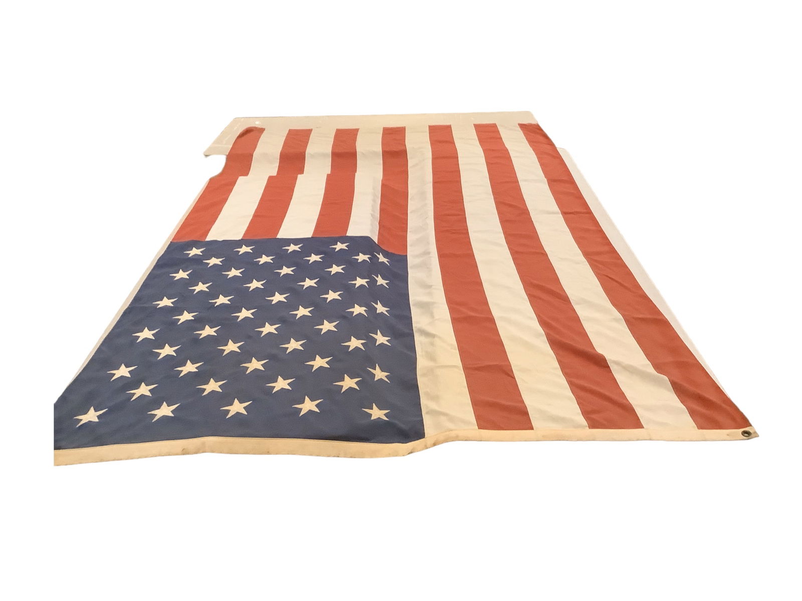 American 50 Star Flag: American 30 Star Flag No tears or repairs. One tiny hole by star. One small stain on white stripe under stars. Labeled 6íx10í.