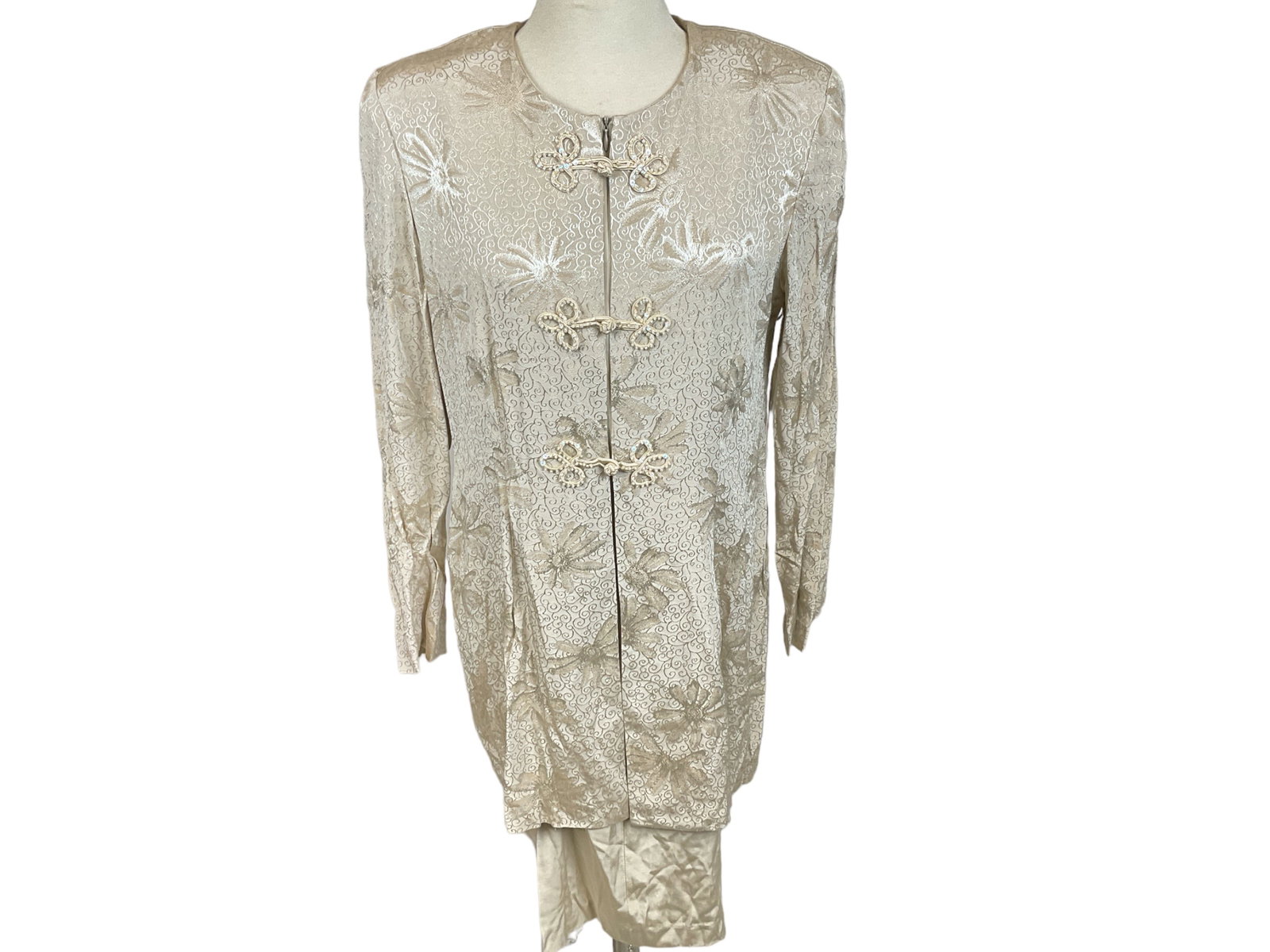 Vintage Asian Inspired Dress By R & M Richards by Karen Kwong: Vintage Asian Inspired Dress By R & M Richards by Karen Kwong Cream colored dress, double lined with a zip closure and front panels that close with woven toggles, floral pattern with glass accent bead