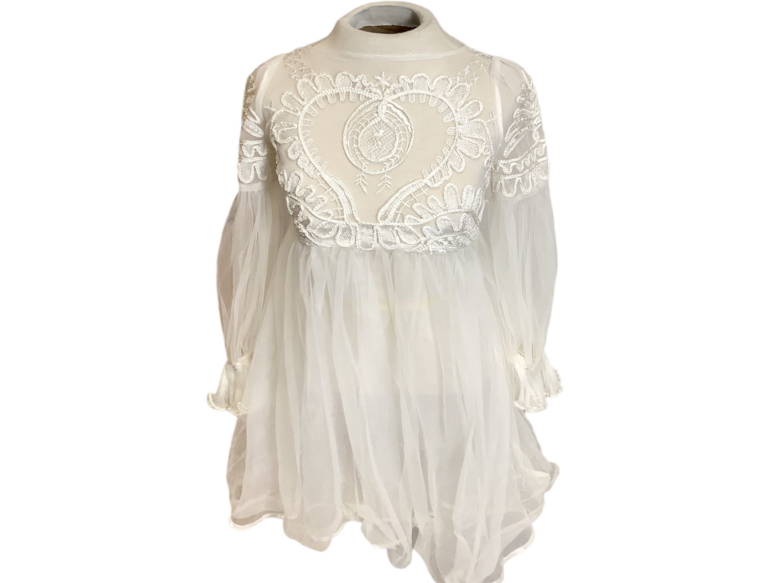 Adorable Girls Dress: Adorable Girls Dress White dress with 3/4 length sleeves featuring a heart woven into the center, see through dress, in need of a tank top and or base, perfect for layering, likely size S in jrís