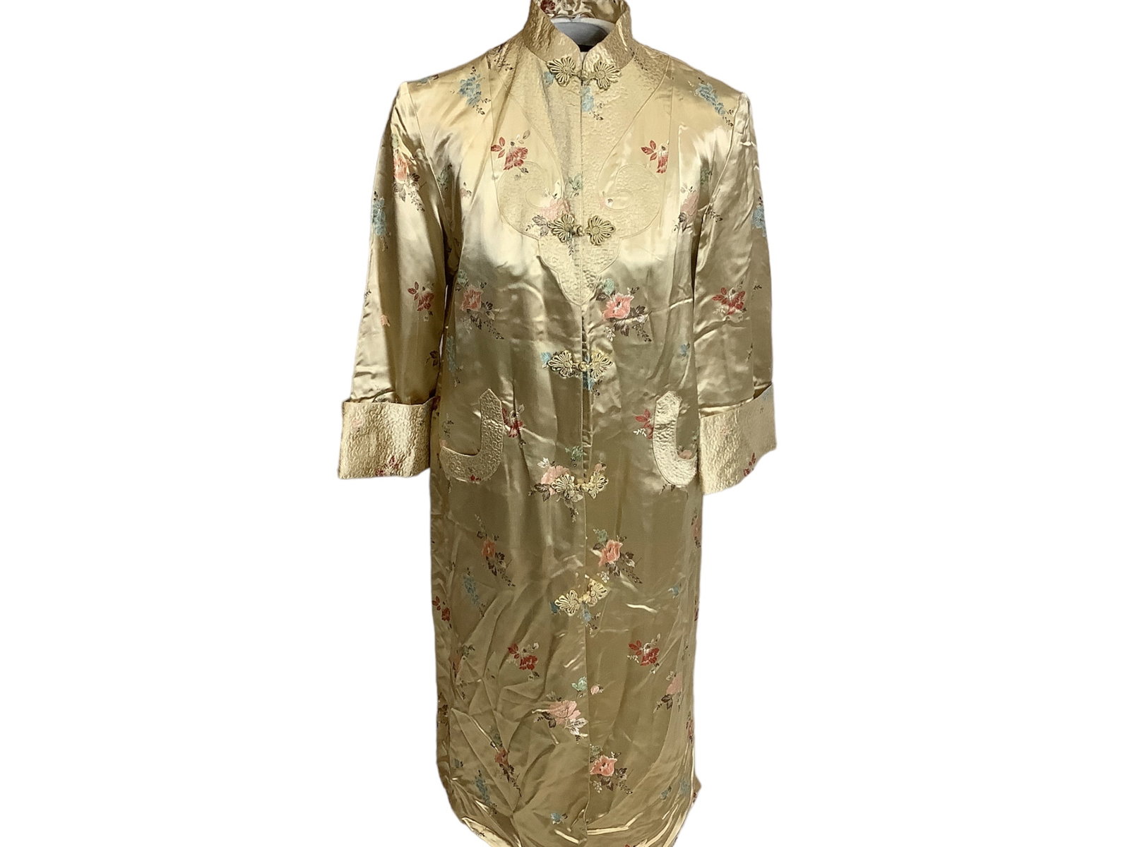 Vintage Asian Jacket: Vintage Asian Jacket Silky champagne colored material with woven floral adornments and toggle closures, size ì36î, made in China, likely M/L, gently used.