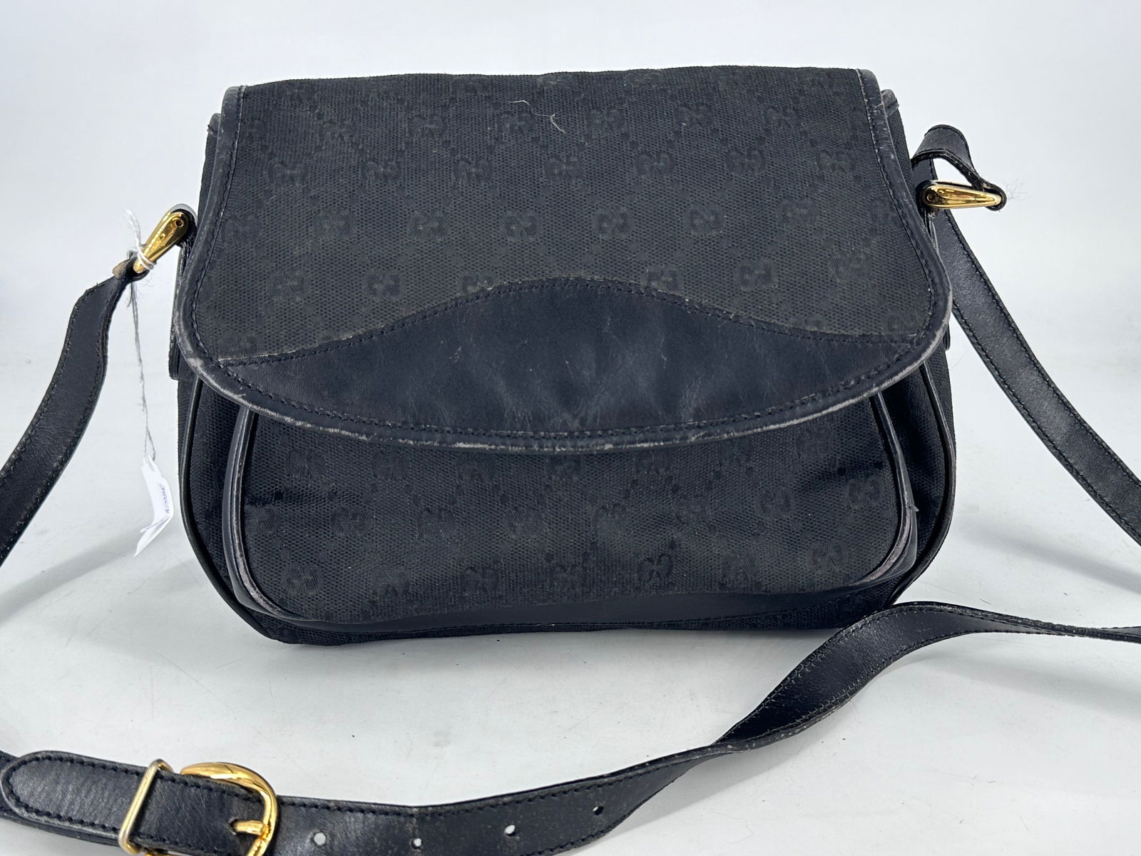 Vintage Gucci Handbag: Vintage Gucci Handbag Used condition with several damages to form and especially to interior liner of bag (significant damage on interior of bag). Features several branded elements including clasp and