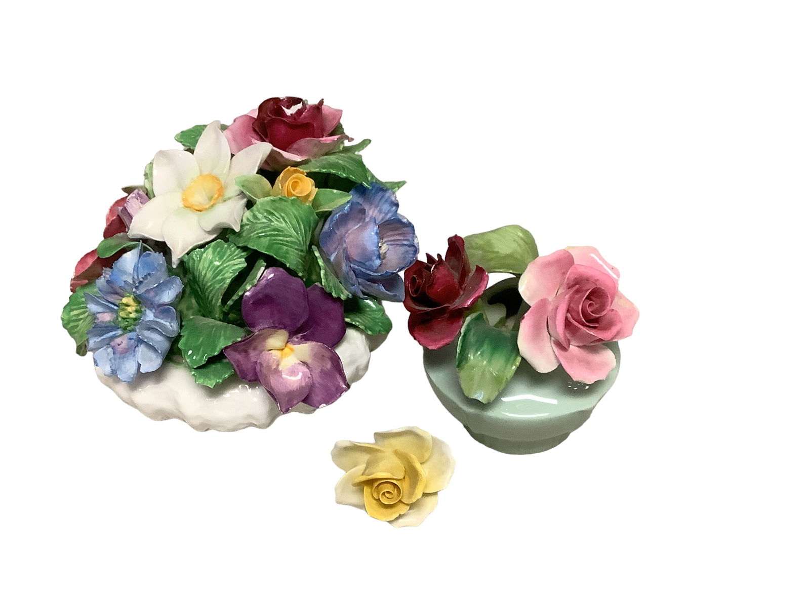 Floral Decor: Floral Decor Two pieces of flower decor. One is damaged. Please see photos. Pieces are both stamped. The smaller one is Staffordshire Floral. The larger is Coalport.