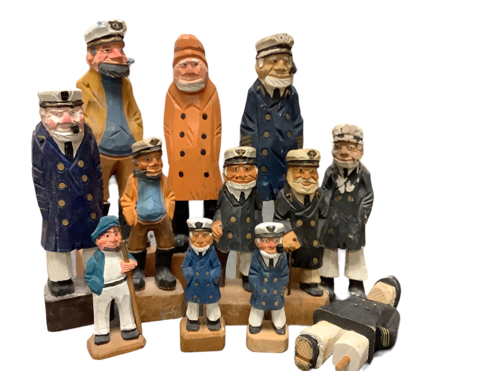 Carved Wood Sea Fairer Lot: Carved Wood Sea Fairer Lot One dozen carved wood figures. Some wear. Noticeable damage to one. Please see photos.