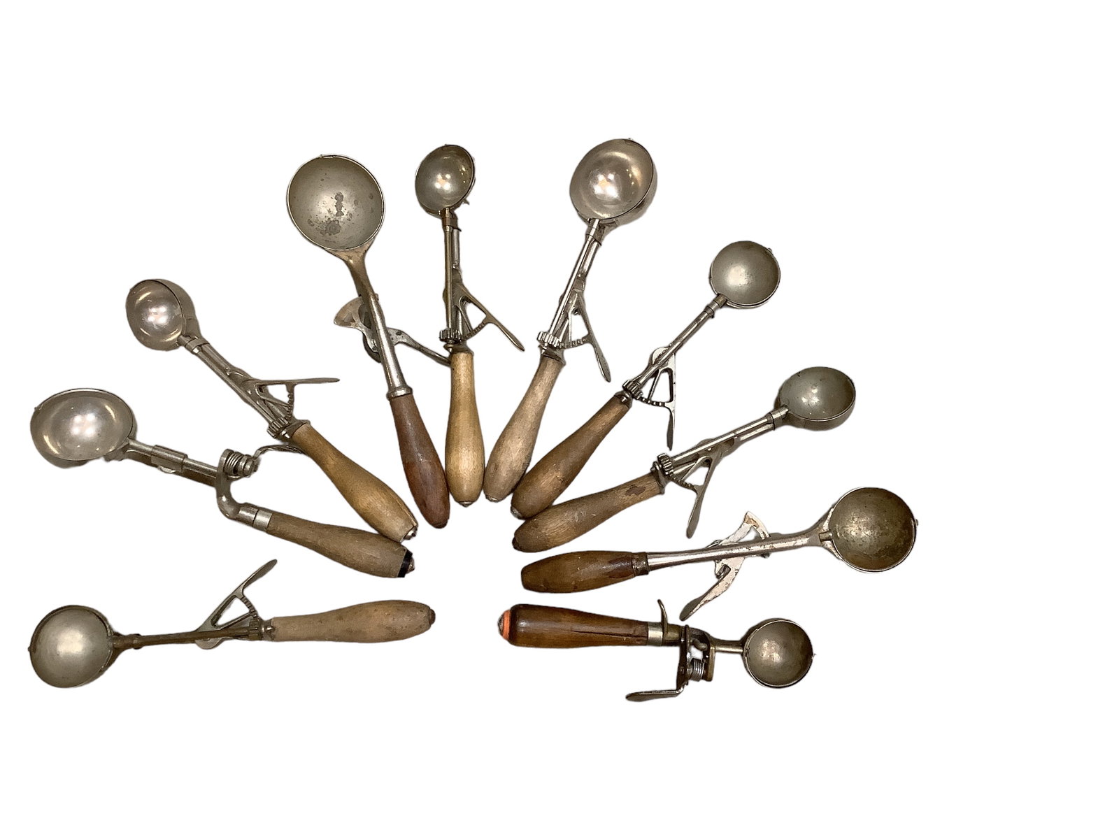 Vintage Ice Cream Scoops Lot of (10): Vintage Ice Cream Scoops Lot of (10) All are metal with wooden handles.