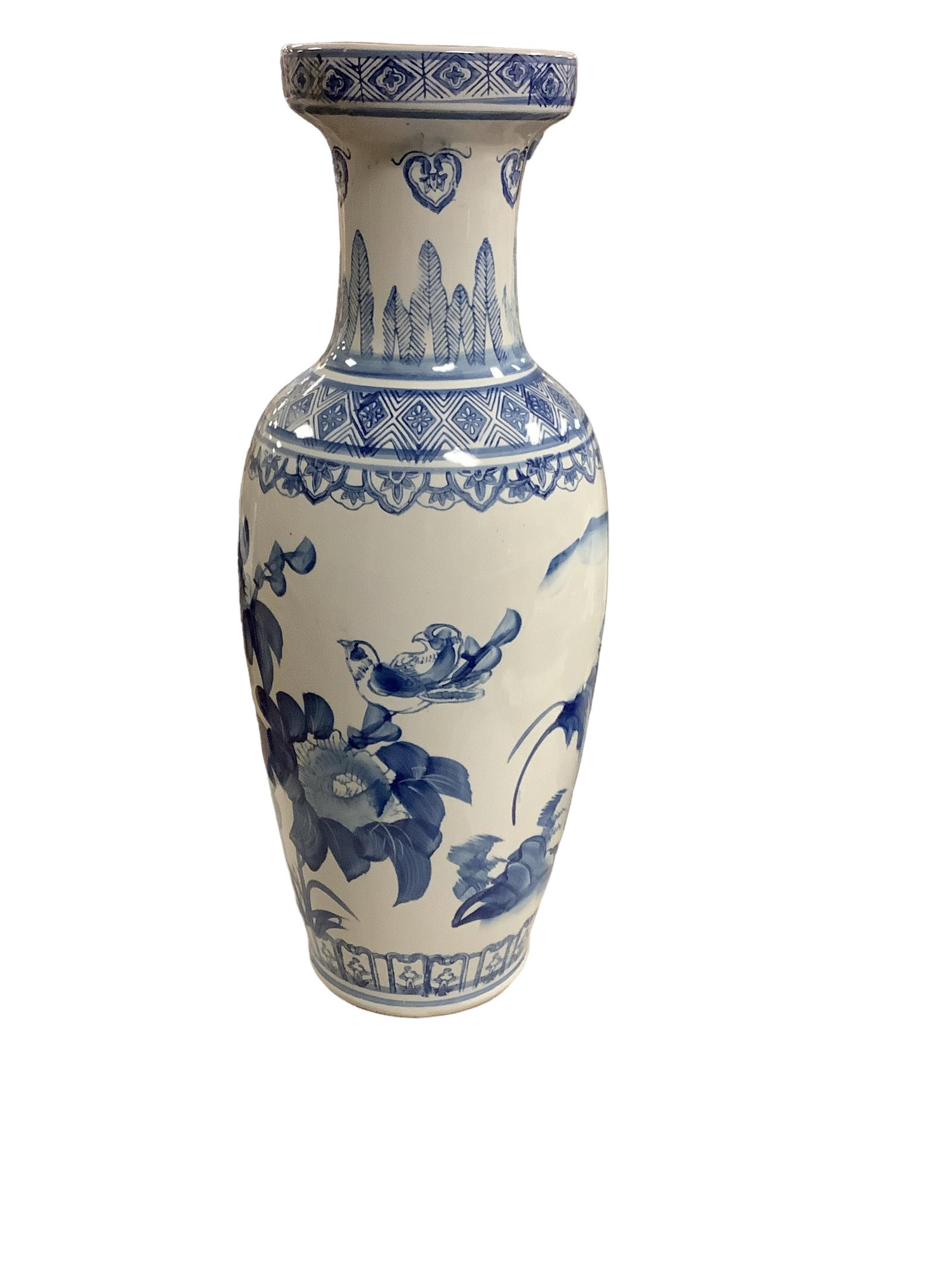 Tall Blue and White Vase: Tall Blue and White Vase Floral motif. Height 24î. Diameter 6.5î. No visible imperfections at listing.
