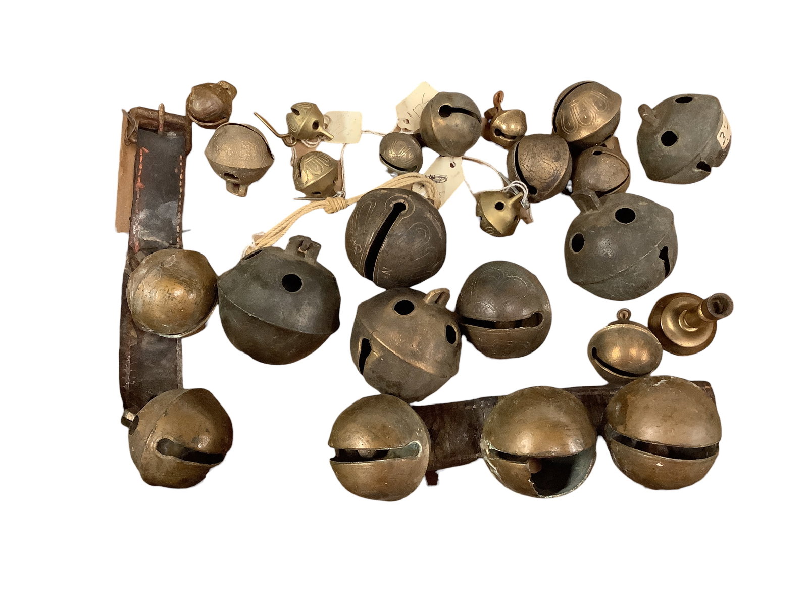 Sleigh Bells: Sleigh Bells Variety of bells (23) ranging in size from 3î in circumference to 9.5î in circumference. Some of the bells are damaged (see photo). Five of the bells are attached to a leather s