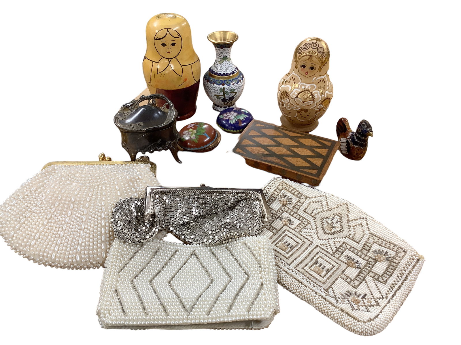 Miscellaneous Pieces and Purses, 2 Sets: Miscellaneous Pieces and Purses, 2 Sets Includes (2) Russian nesting dolls, (4) vintage purses, (3) trinket boxes and a bud vase.