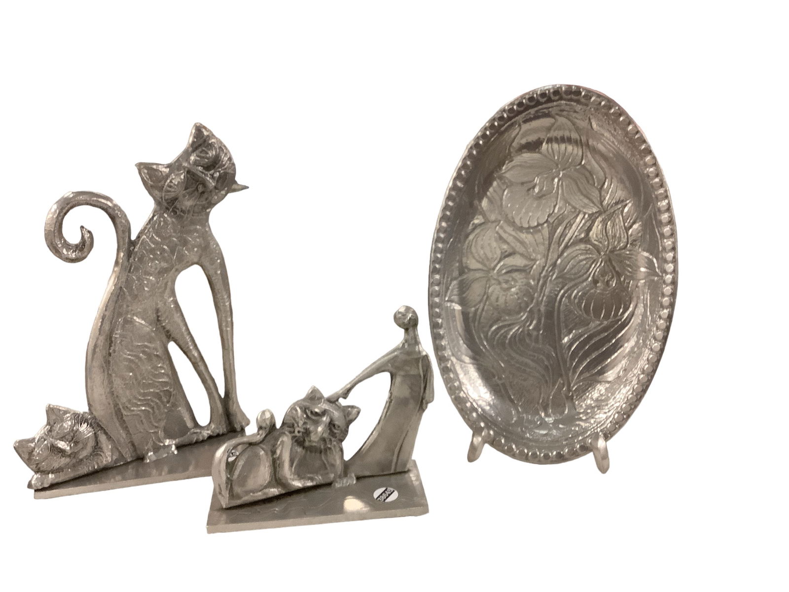 Decorative Cast Aluminum Pieces by Don Drumm: Decorative Cast Aluminum Pieces by Don Drumm Lot of (3). Cat sculpture is 15î tall. Lion is 8î tall x 8 1/2î wide x 3 5/8î deep. Oval platter is 17î long x 10 3/4î wide a