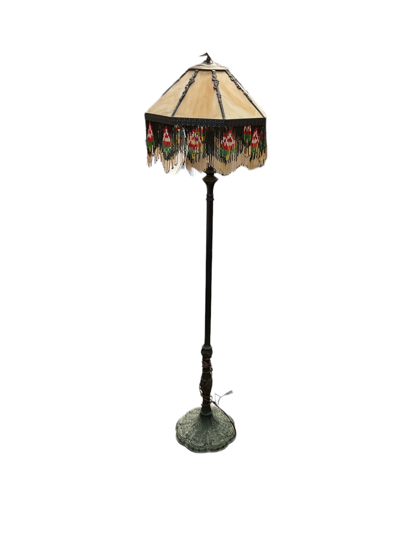 Antique Slag Panel Glass Shade on Cast Iron Lamp Base: Unique vintage lampshade. The shade has a beaded fringe along the outside of the lamp. Beaded fringe is delicate and has a unique design. 20" in diameter. 60" tall.