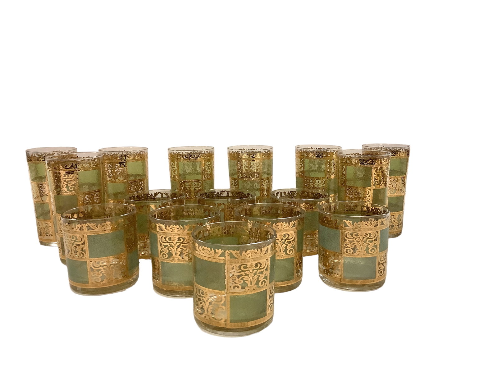 Culver Prado Glasses: Culver Prado Glasses Lot of (16) green and 22 karat gold appliquÈ checkered barware including (8) highball and (8) water glasses.