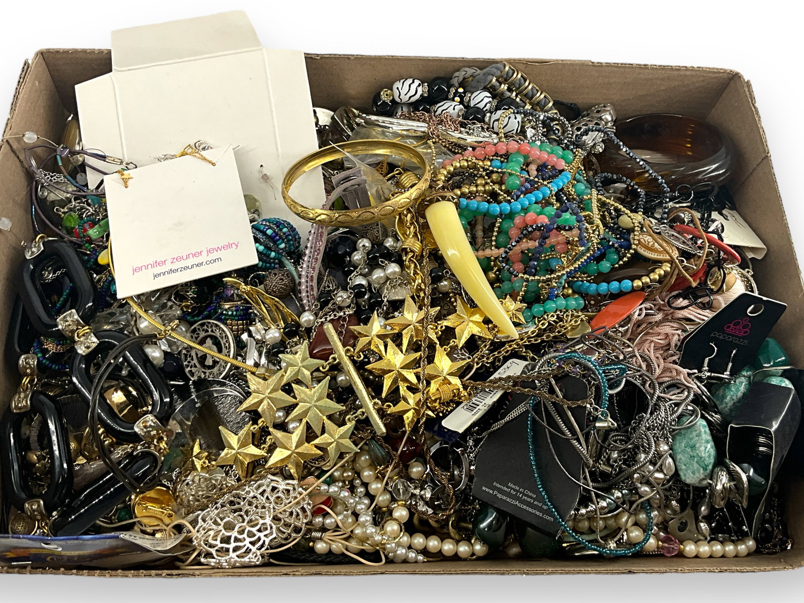 Large Lot Of Costume Jewelry: Large Lot Of Costume Jewelry Mostly modern styles, dozens of necklaces, bracelets, earrings, and more! Hello Kitty pendant, faux amber bangle, glass beaded accessories, faux pearl accessories, new old