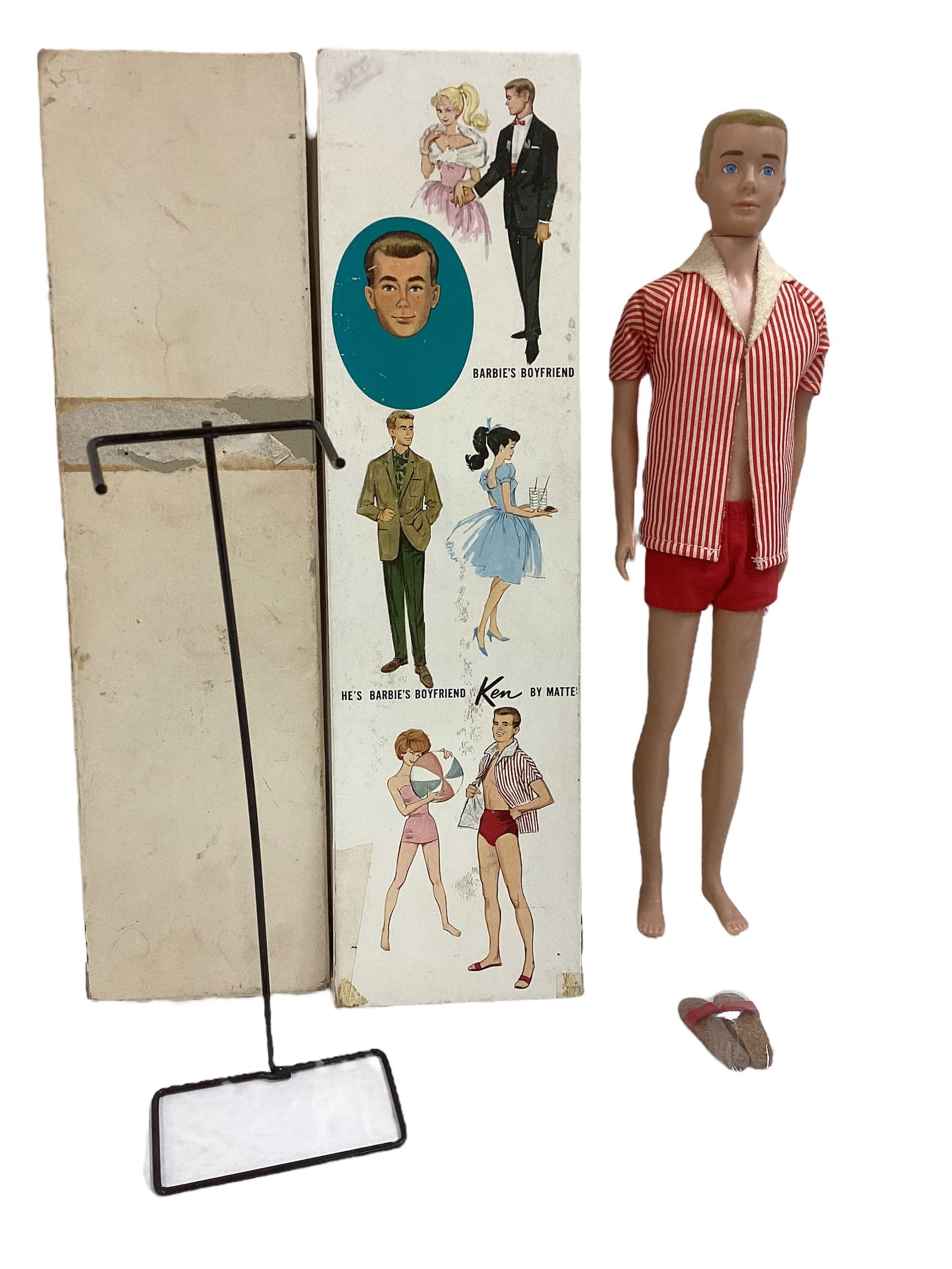 Blond Ken in Original Box: Blond Ken in Original Box (1) Ken Doll with painted blond hair, in very good shape, no neck splits. Ken comes with his striped jacket, red shorts, his sandals and stand all in a very nice original box
