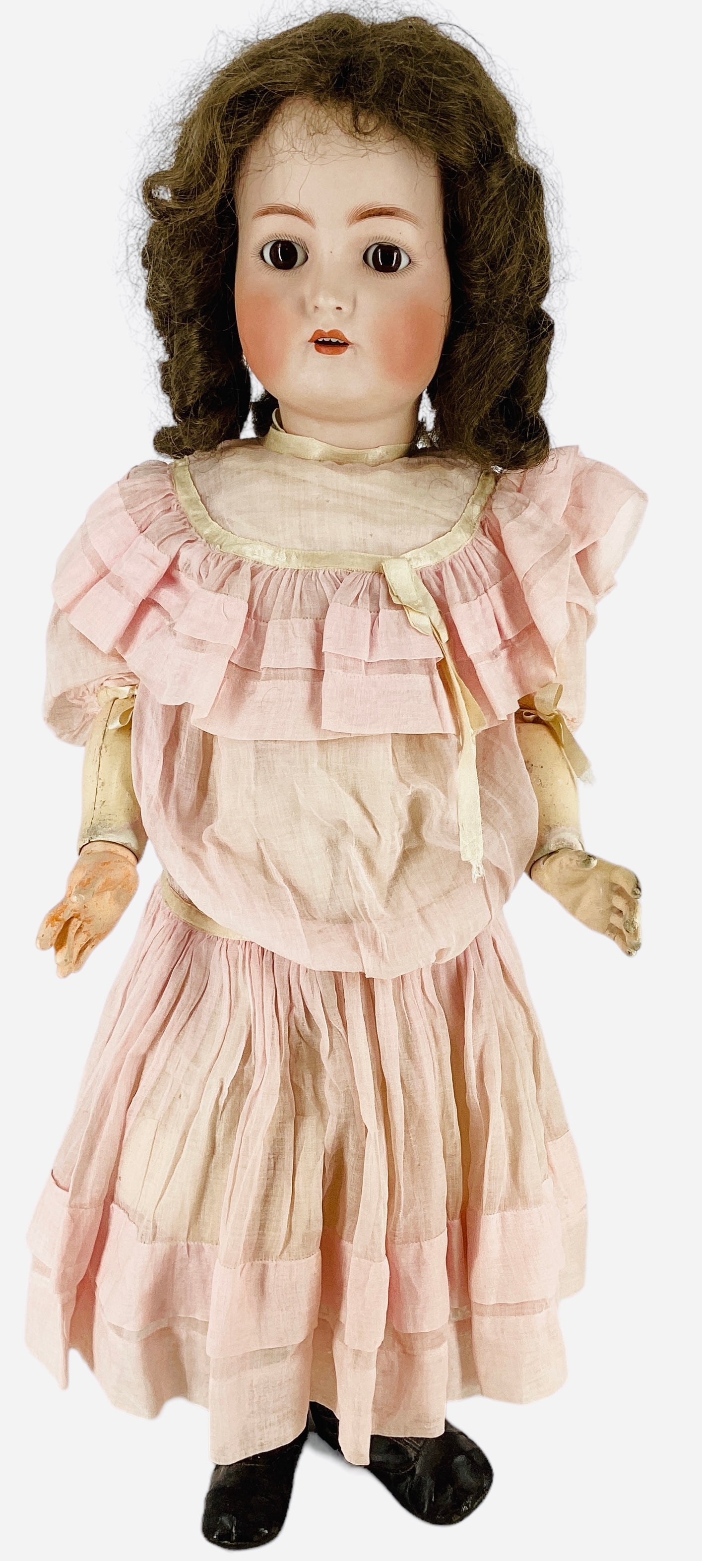 K&R Simon & Halbig bisque socket head girl.: K&R Simon & Halbig bisque socket head girl. 29 1/2" doll with likely original wig, glass sleep eyes, pierced ears, open mouth with teeth, jointed composition body. Doll wears an antique drop waist dre