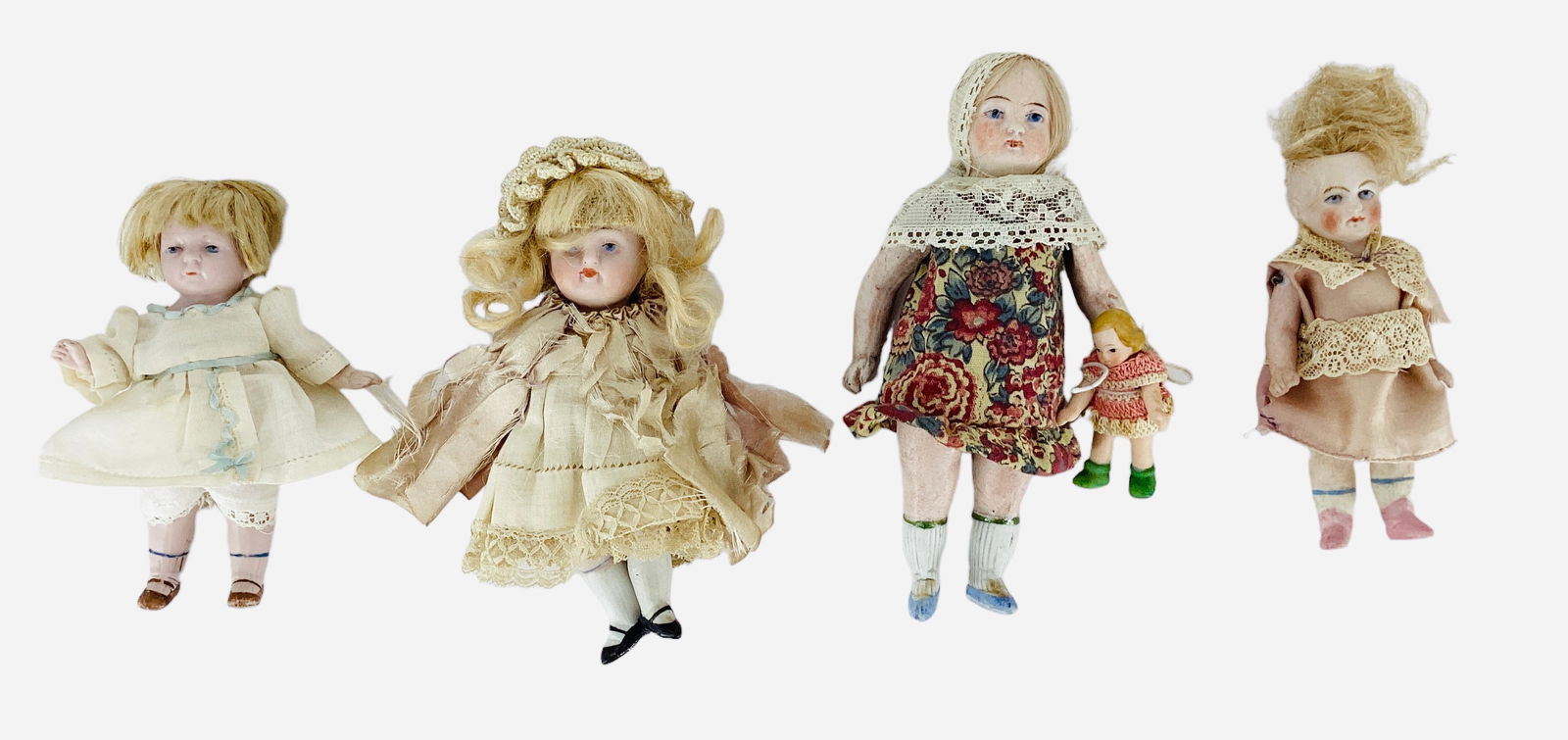 (4) Small Germany all-bisque dolls. (1 of 3)