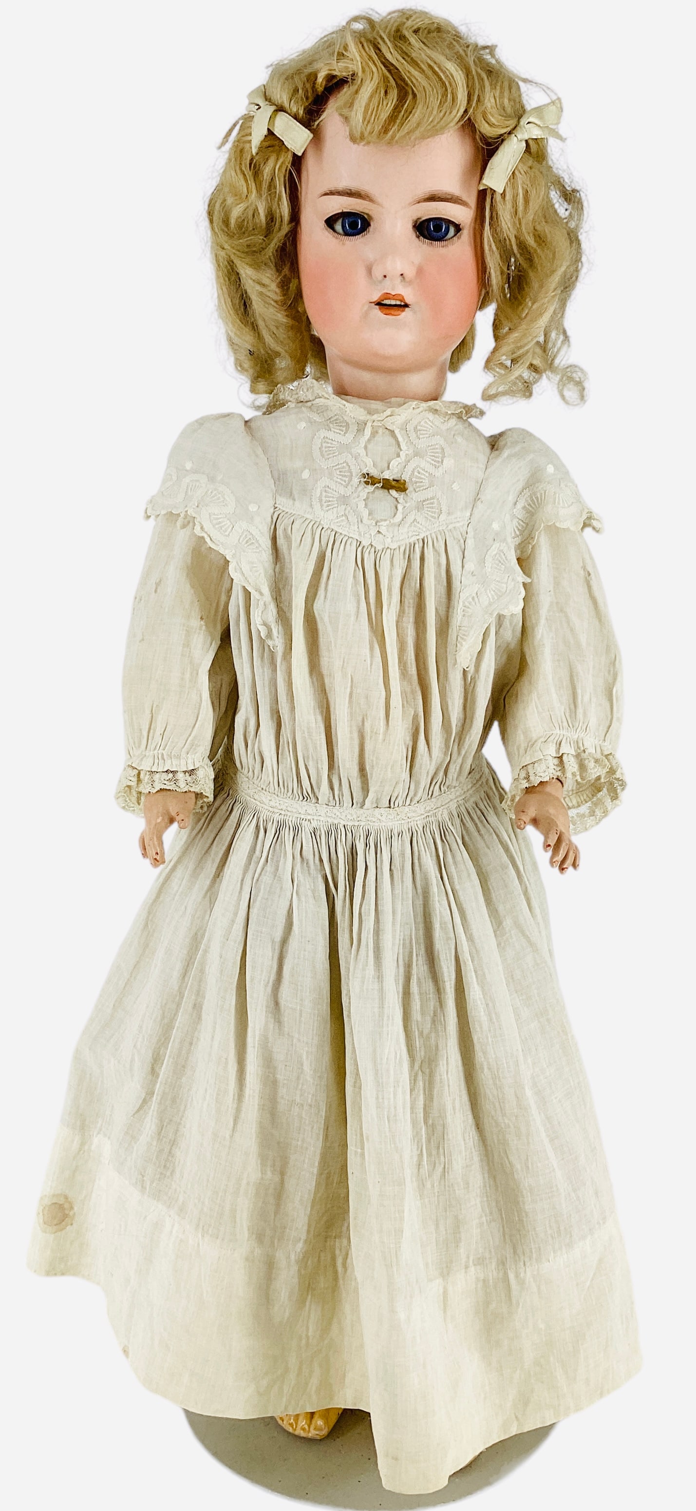 George Borgfeldt bisque socket head girl.: George Borgfeldt bisque socket head girl. 24" doll with antique mohair wig, glass sleep eyes with eyelashes, open mouth with teeth, on jointed composition body. Eyes have been reset, lashes are thin,